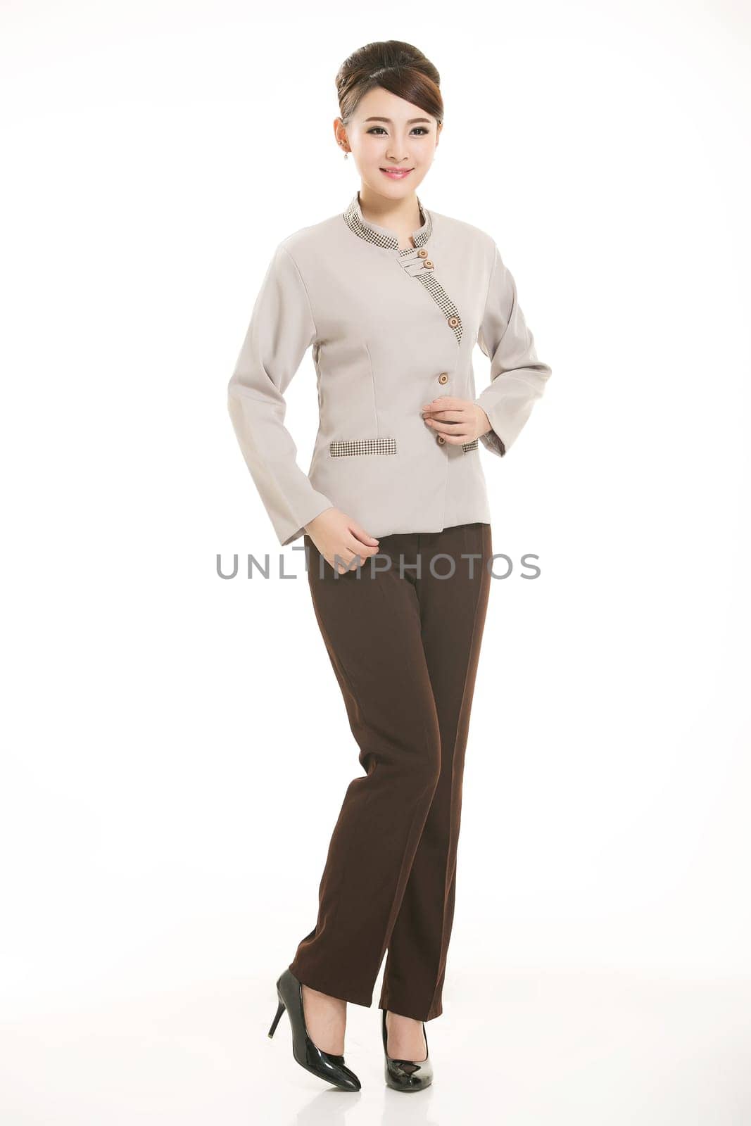 In a variety of occupation clothing cleaners stand in front of a white background