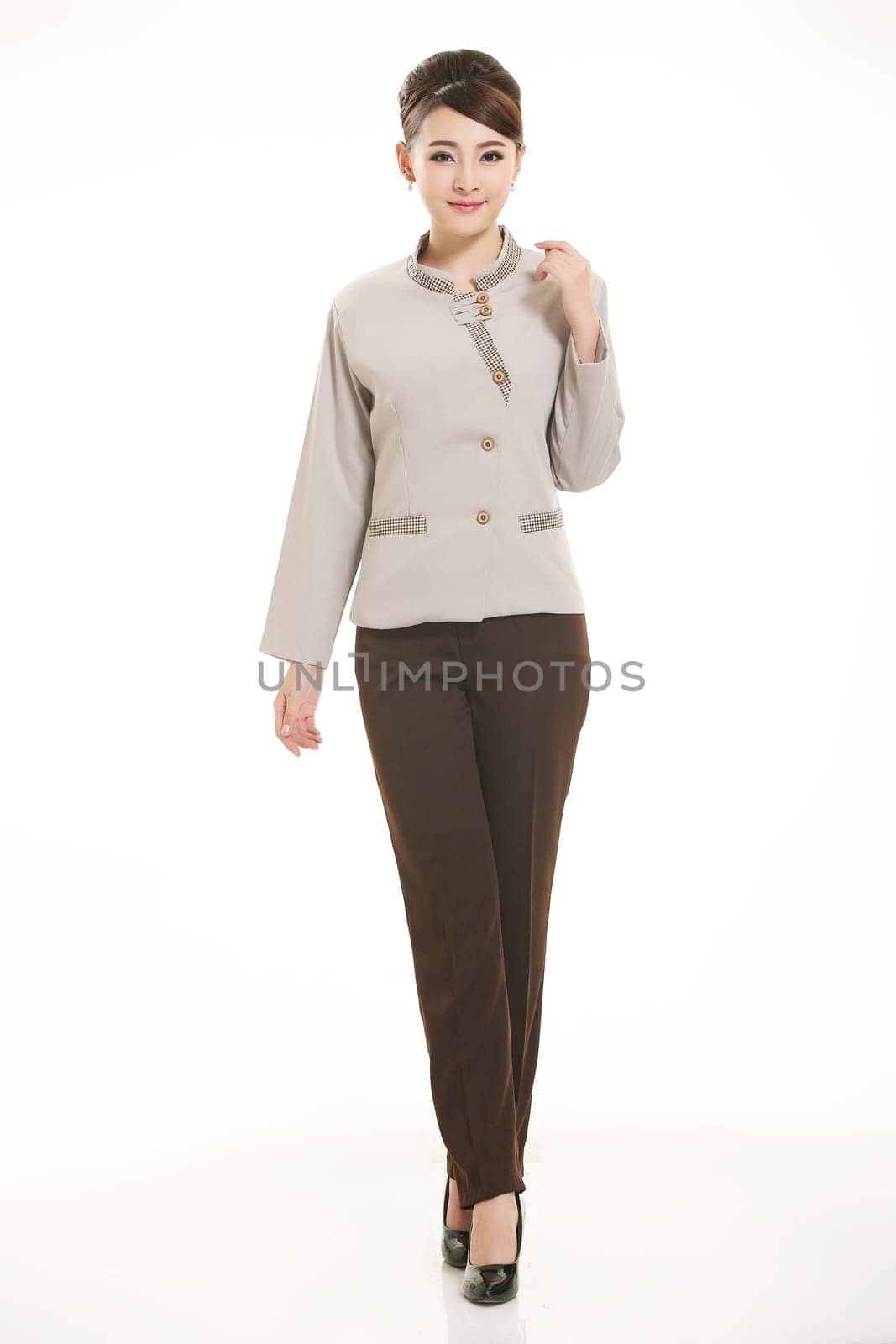 In a variety of occupation clothing cleaners stand in front of a white background
