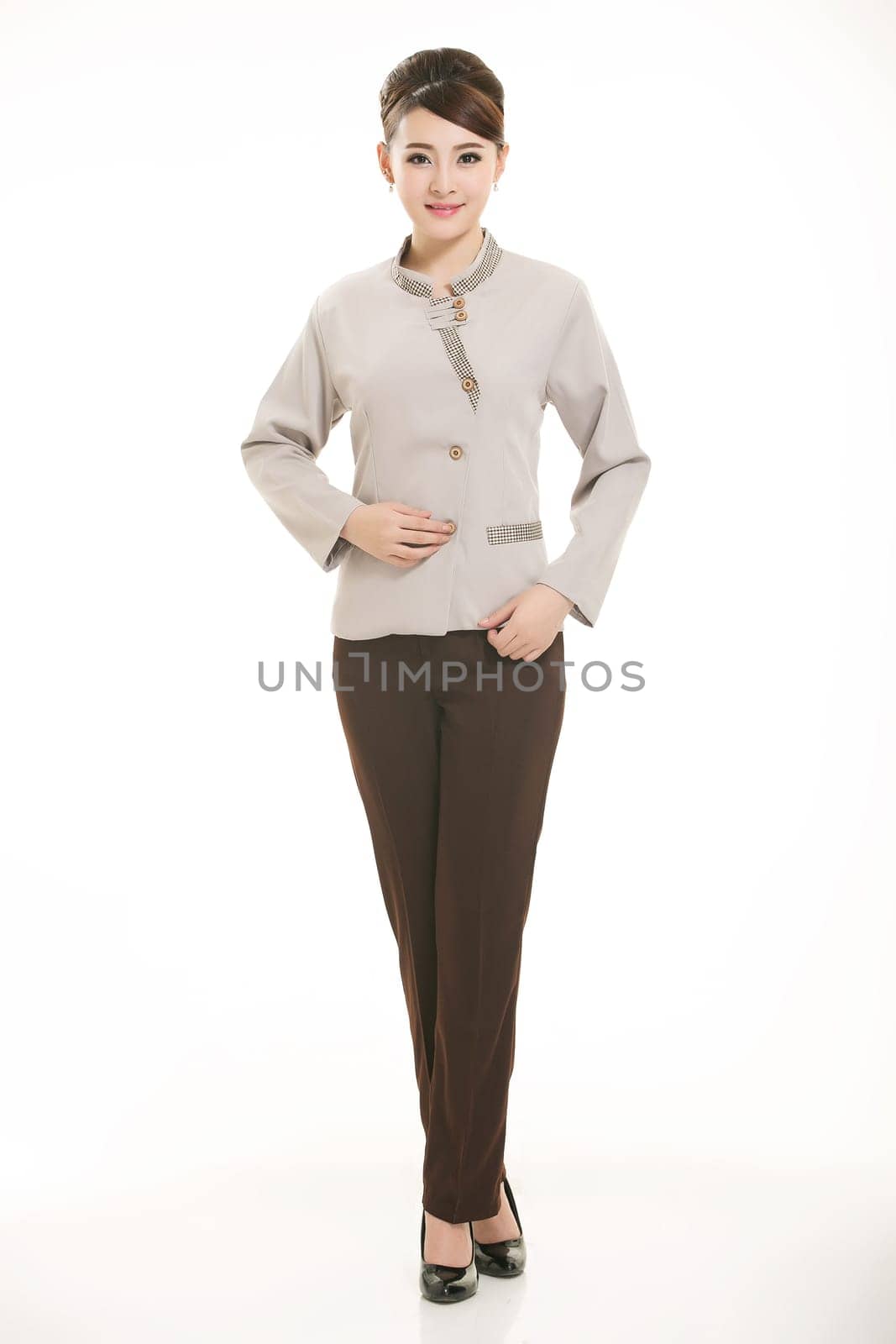 In a variety of occupation clothing cleaners stand in front of a white background