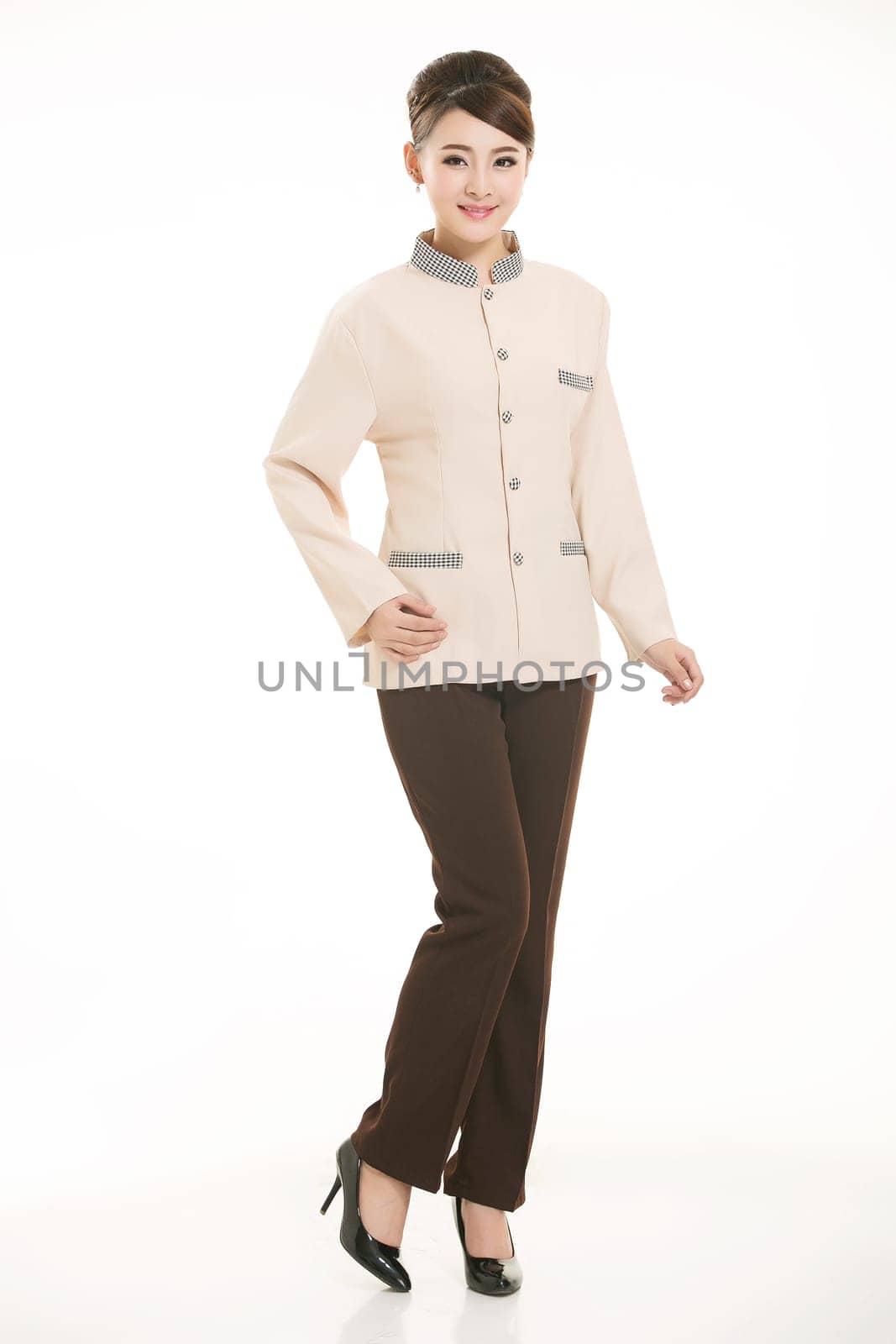 In a variety of occupation clothing cleaners stand in front of a white background