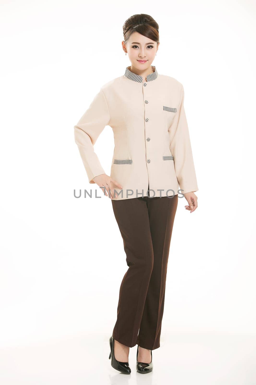 In a variety of occupation clothing cleaners stand in front of a white background