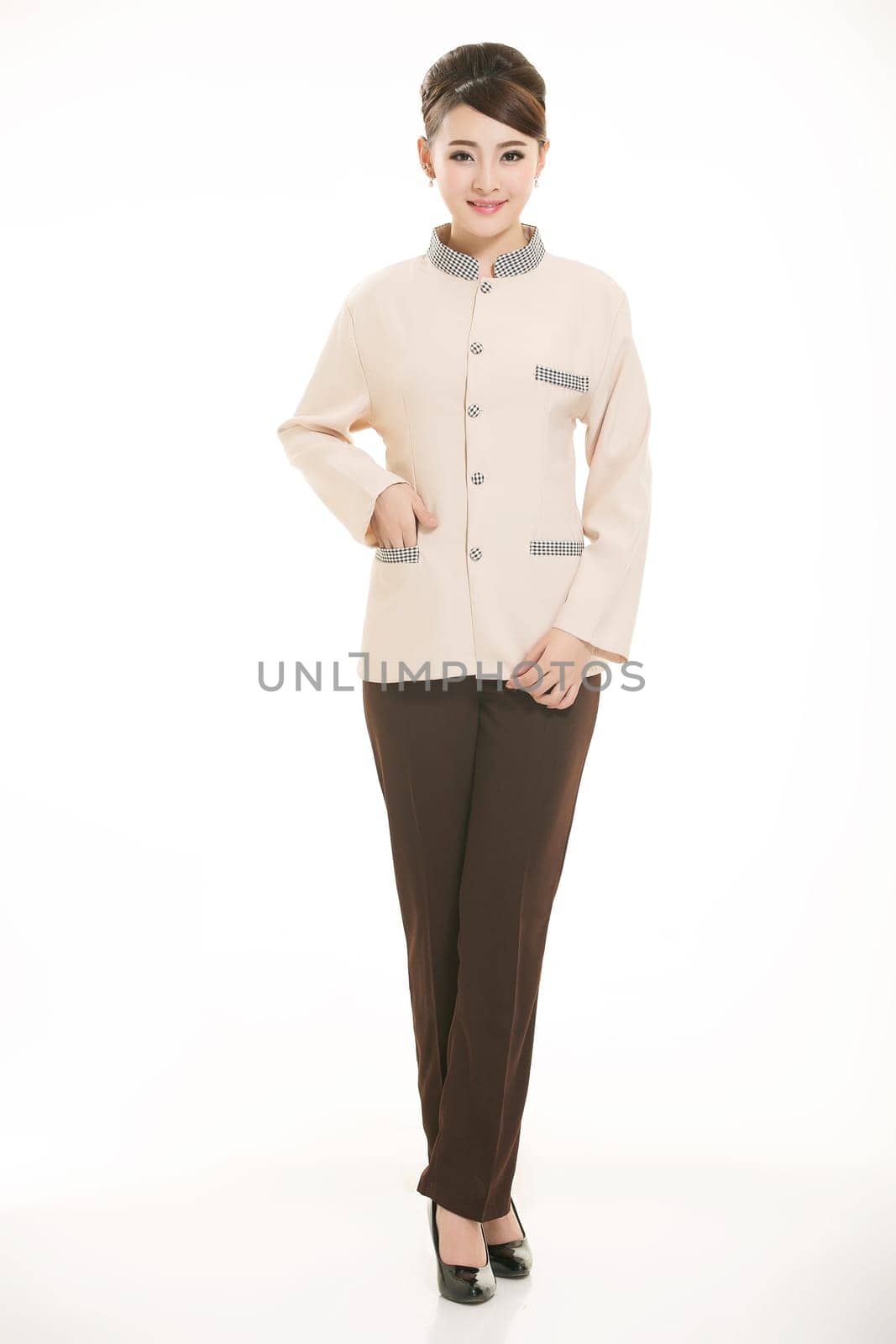 In a variety of occupation clothing cleaners stand in front of a white background