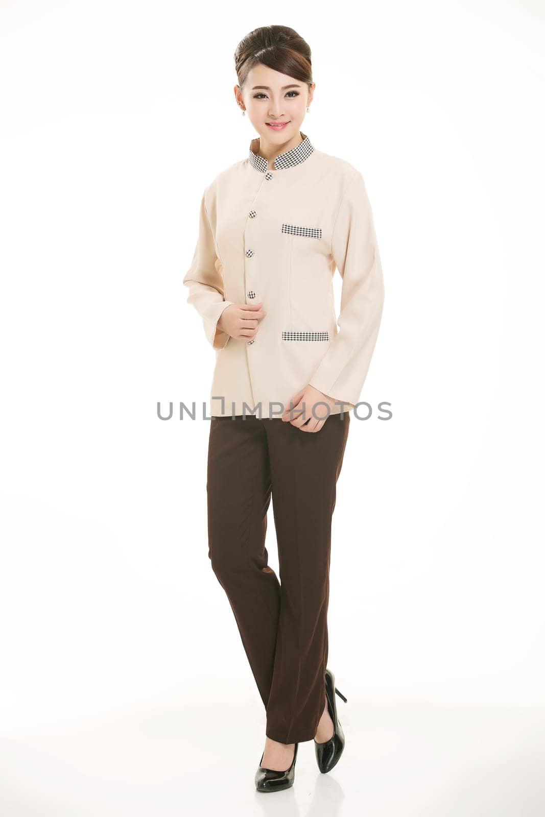 In a variety of occupation clothing cleaners stand in front of a white background