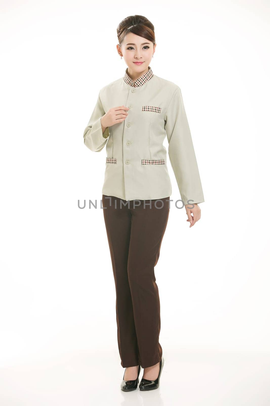 In a variety of occupation clothing cleaners stand in front of a white background