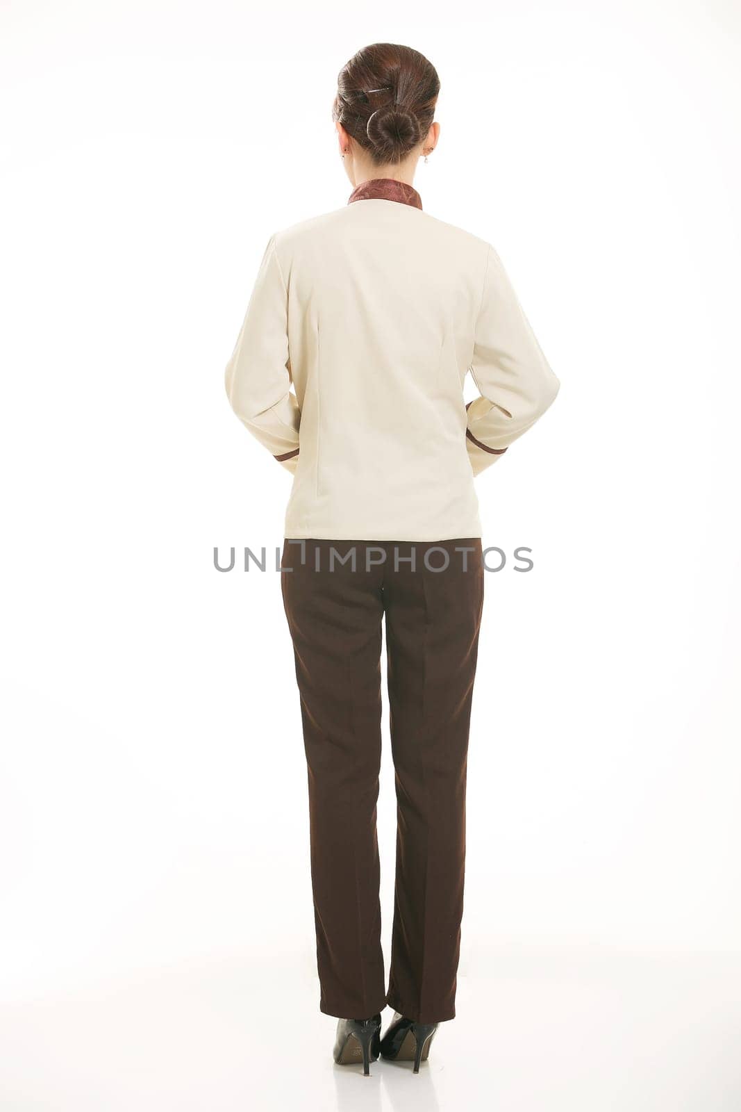 In a variety of occupation clothing cleaners stand in front of a white background