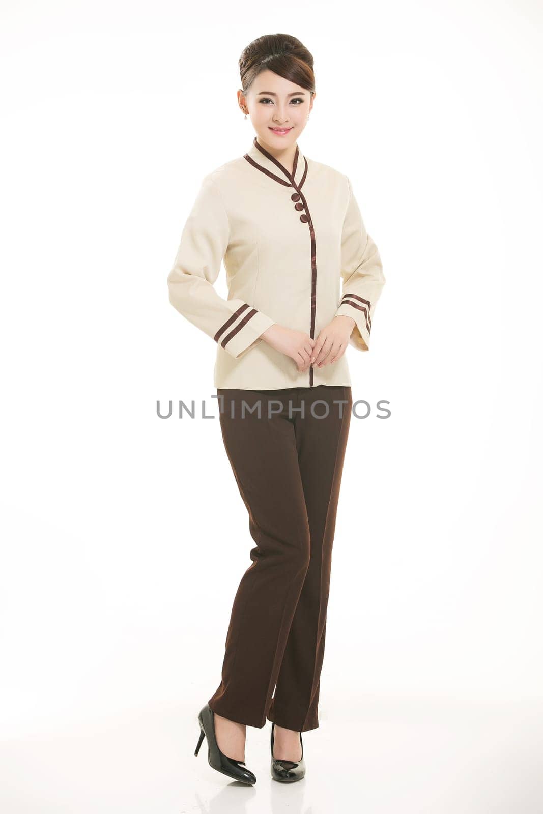 In a variety of occupation clothing cleaners stand in front of a white background