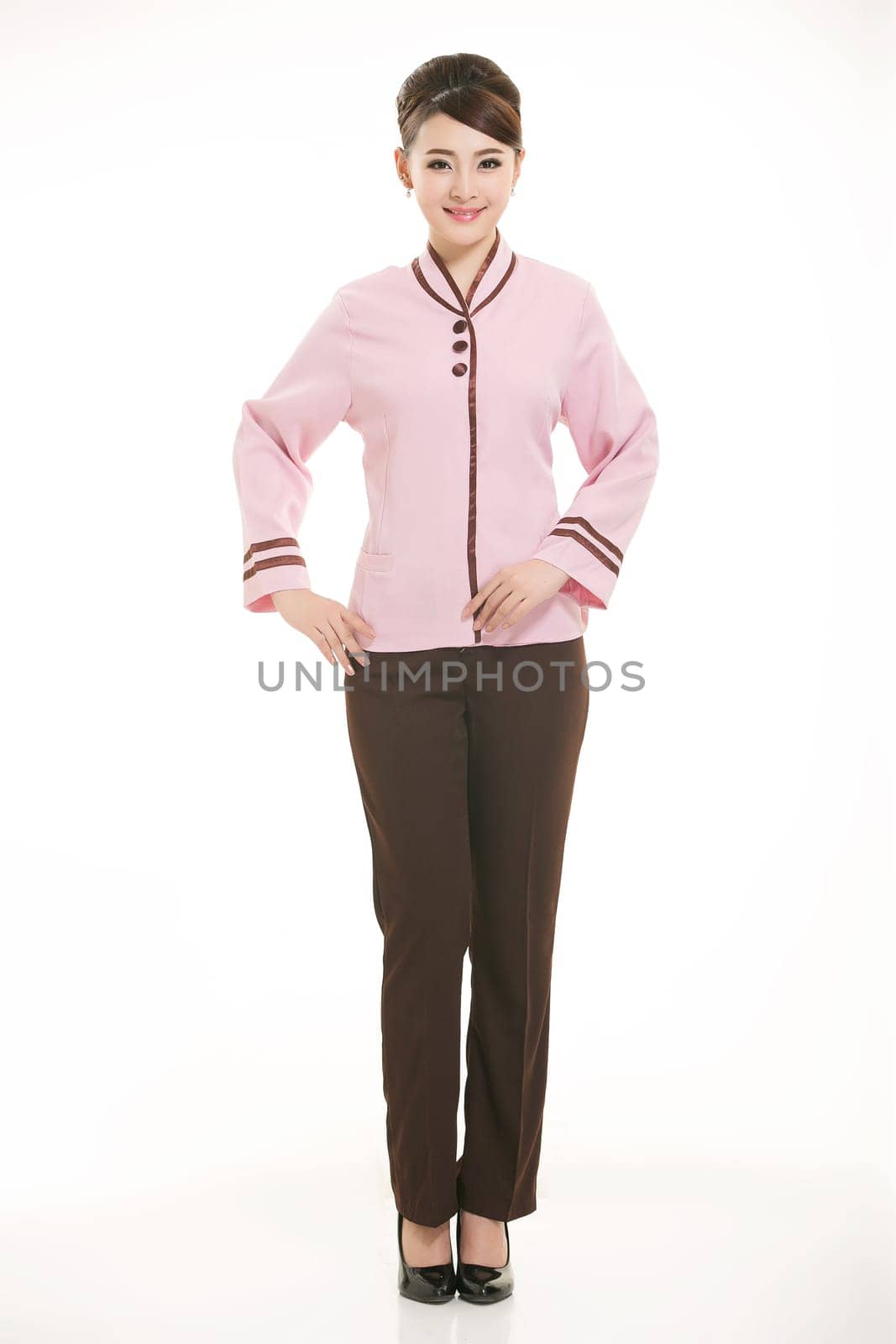 In a variety of occupation clothing cleaners stand in front of a white background