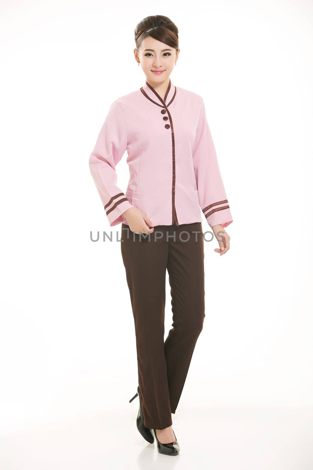 In a variety of occupation clothing cleaners stand in front of a white background