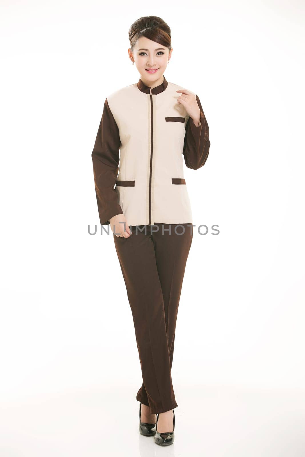 In a variety of occupation clothing cleaners stand in front of a white background
