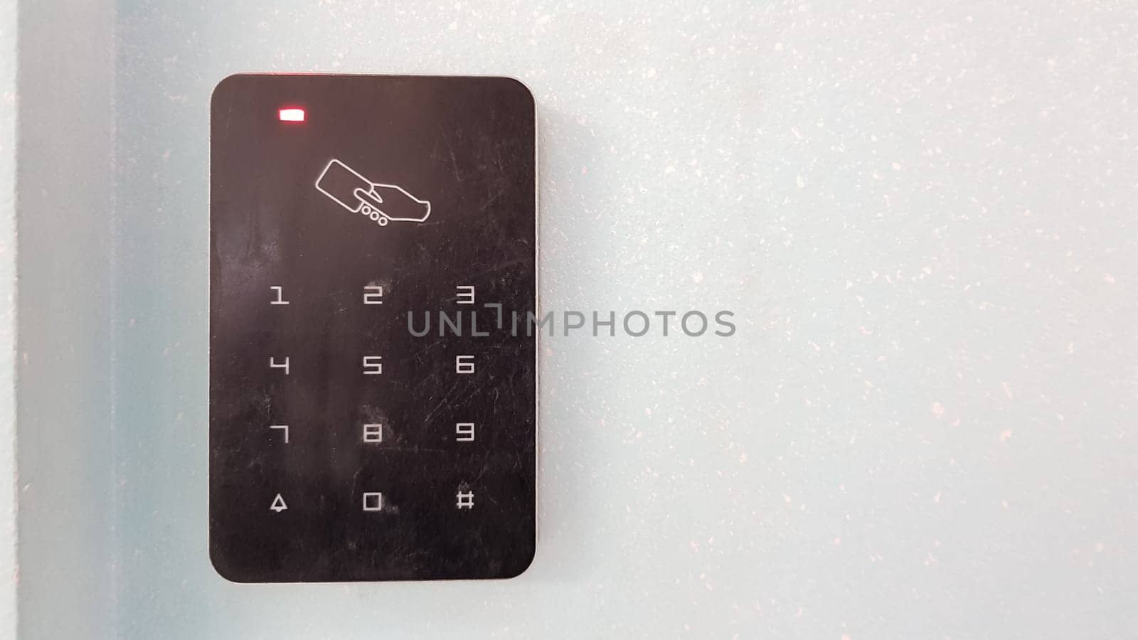 Electronic lock on the wall with copy space. Digital security systems for door security. Selective focus