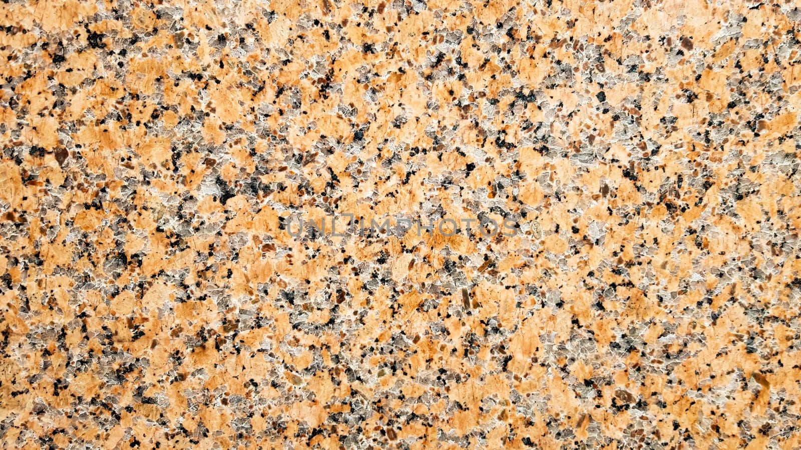 Real natural brown granite pattern, polished mineral slice. Seamless cracked marble damaged concrete texture. Architectural background. Brown spots on a stone background. marbling.