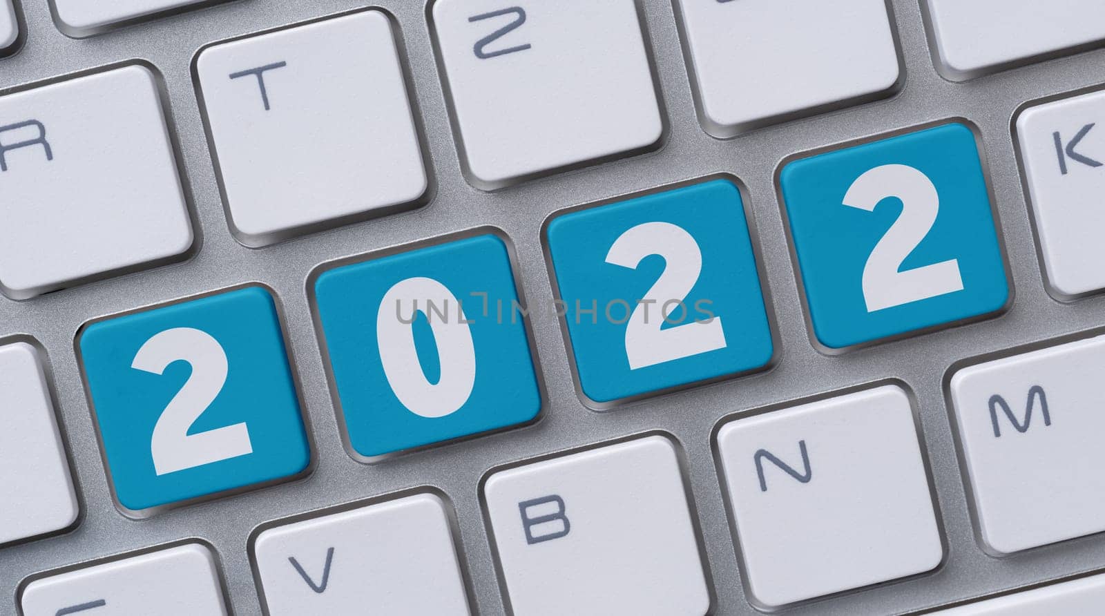 A computer keyboard with the word 2022