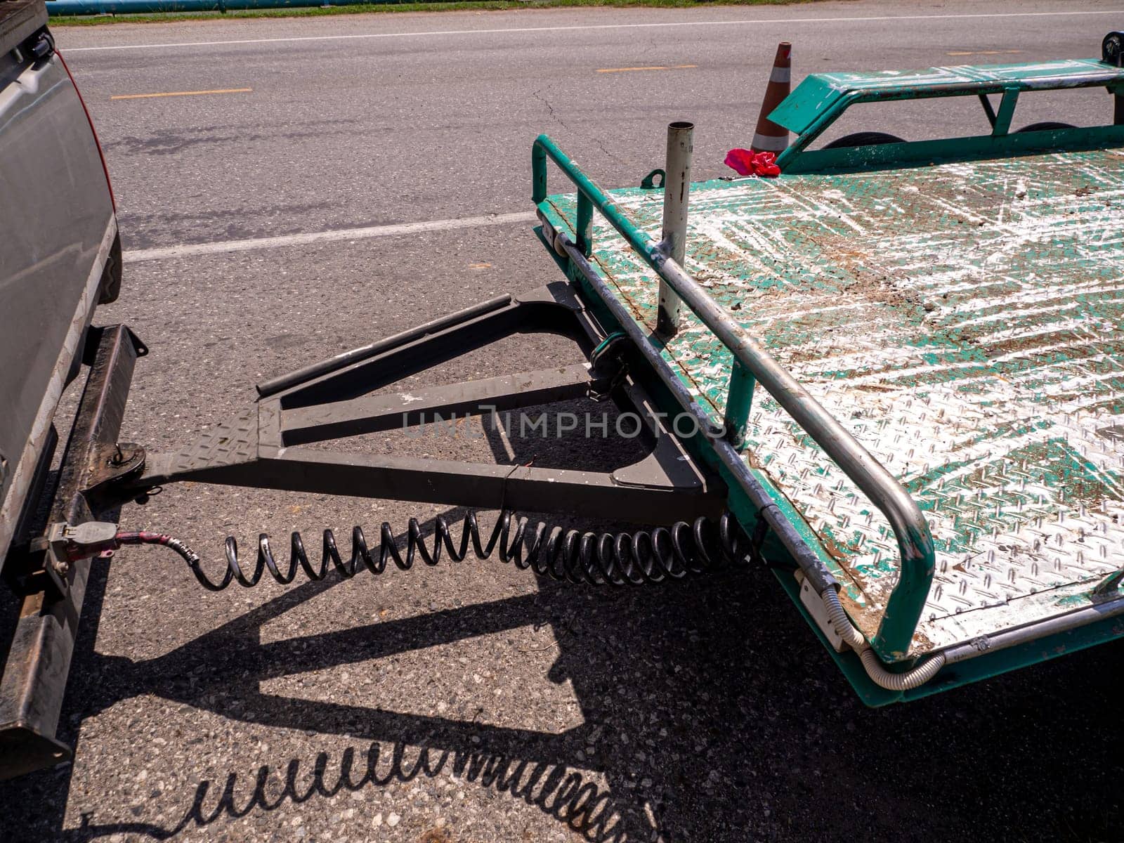 Open car trailer. Shop selling Open car trailer. on the road