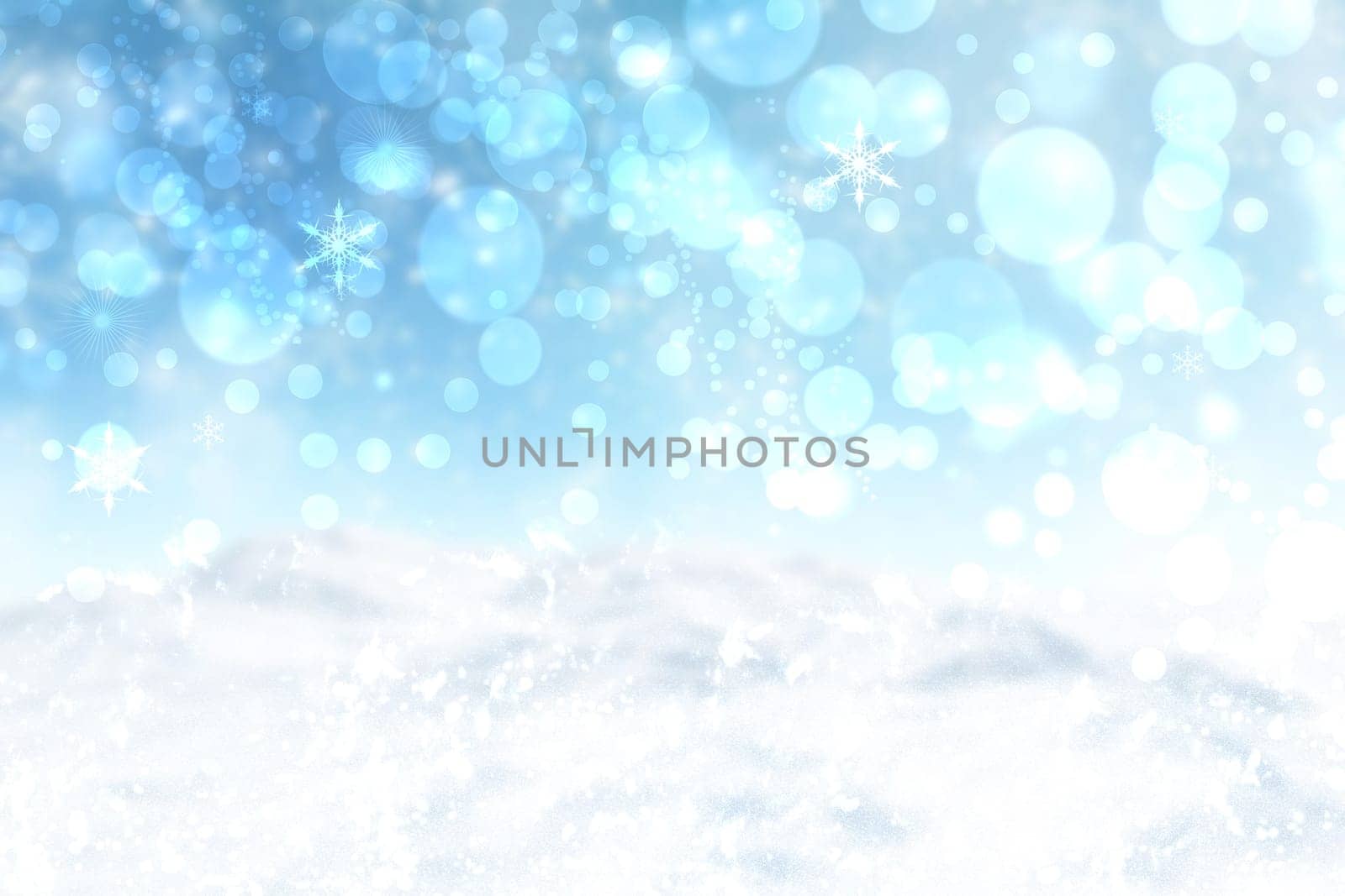 Abstract blurred festive winter christmas or Happy New Year background with shiny blue and white bokeh lighted snow landscape with sky. Space.