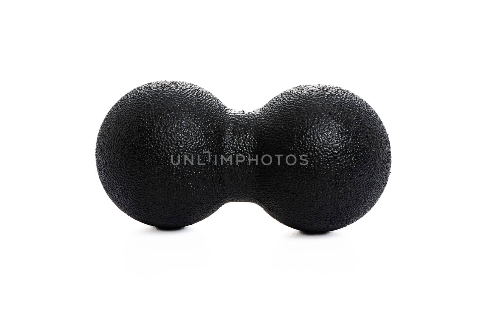 black double massage ball close-up for yoga on white isolated background. High quality photo