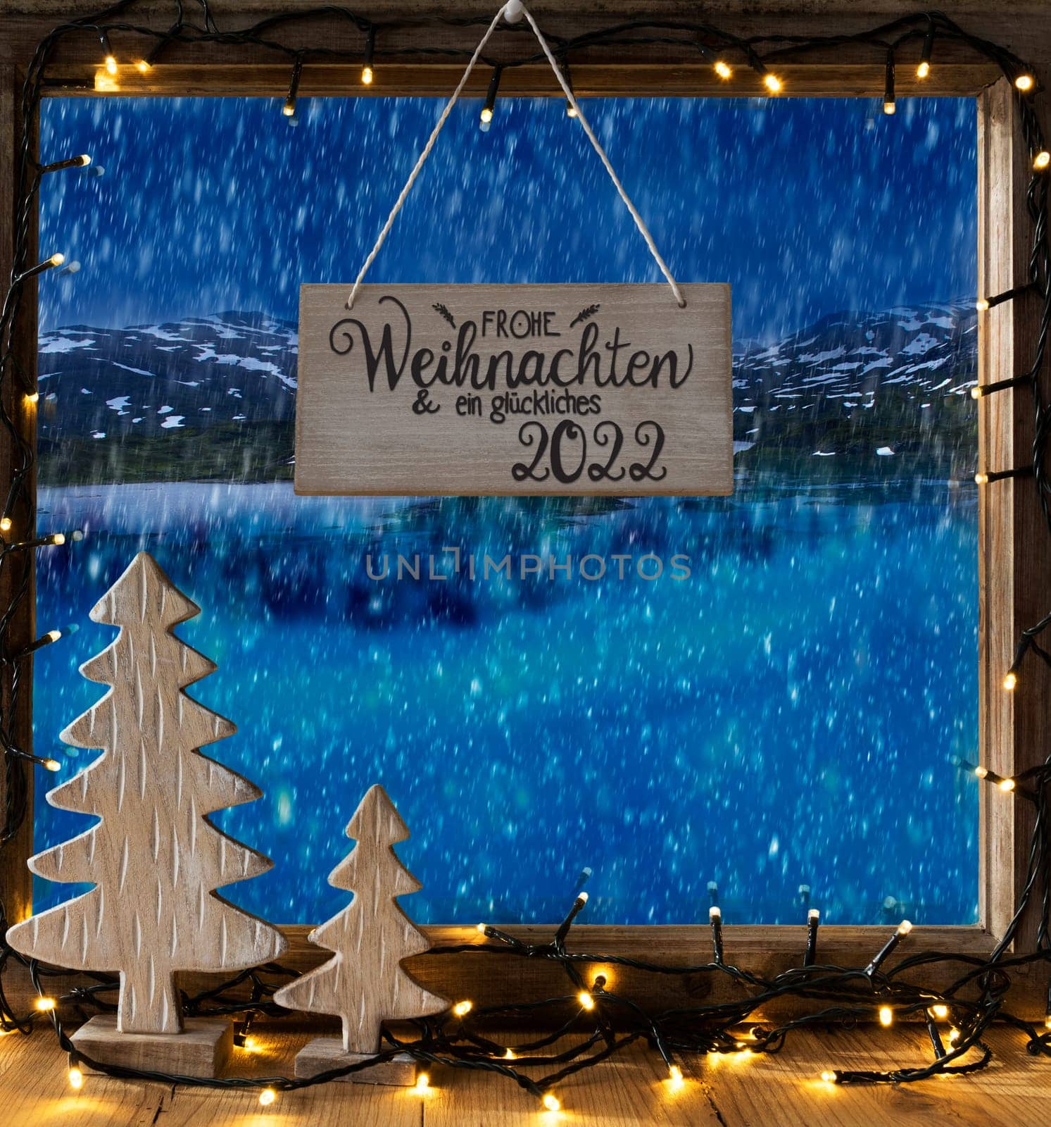 Window With Sign With German Calligraphy Frohe Weihnachten Und Ein Glueckliches 2022 Means Merry Christmas And A Happy 2022. View Till Snowy Lake, Christmas Decoration Like Tree