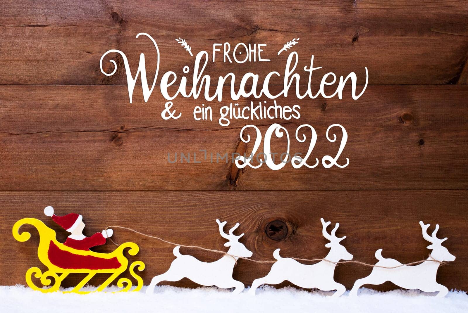 German Calligraphy Frohe Weihnachent Und Ein Glueckliches 2022 Means Merry Christmas And Happy 2022. Santa Claus With Sleigh And Reindeers. Wooden Background With Snow