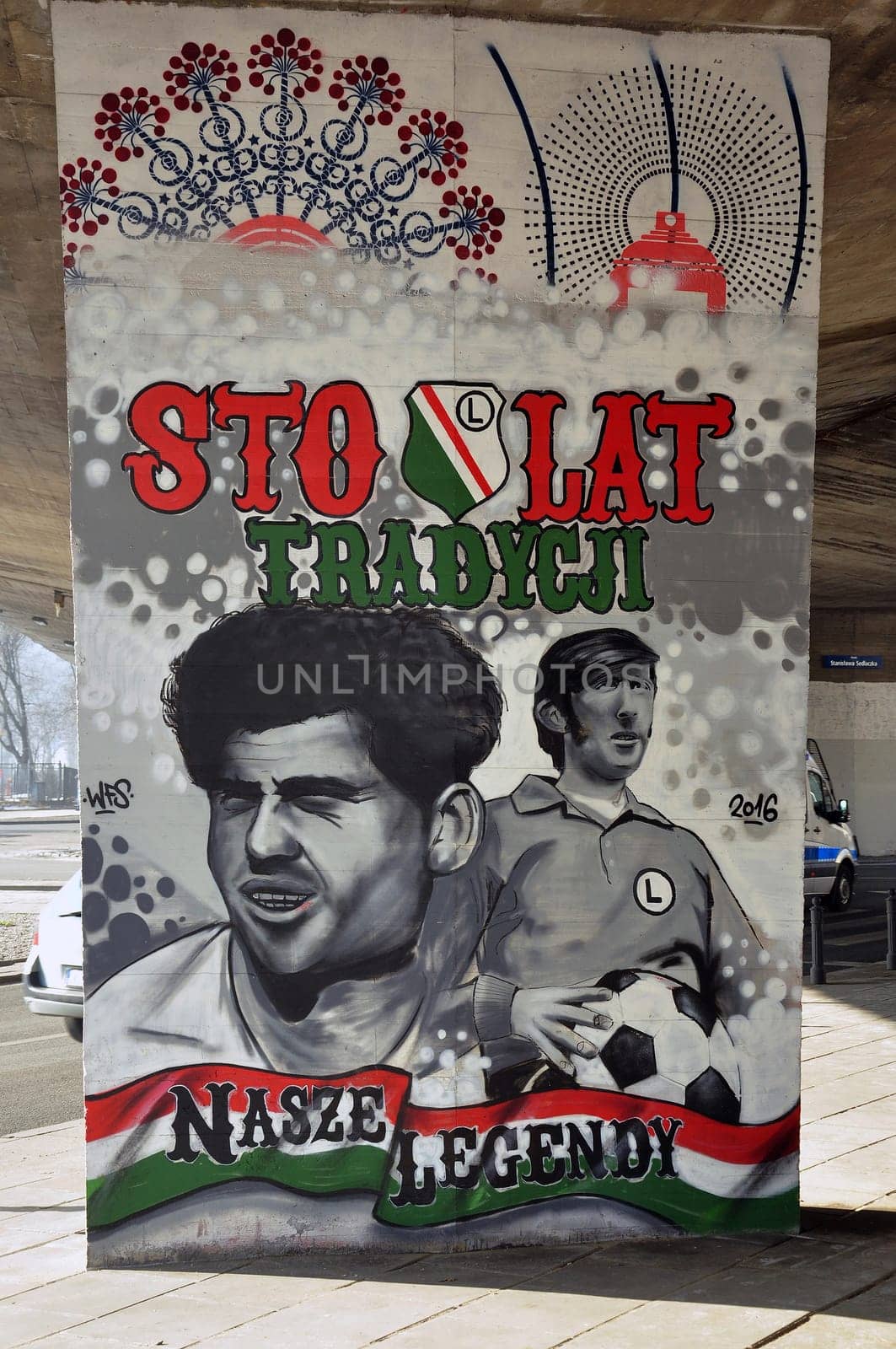 mural of the players of the Legia football club on the pillar of the bridge