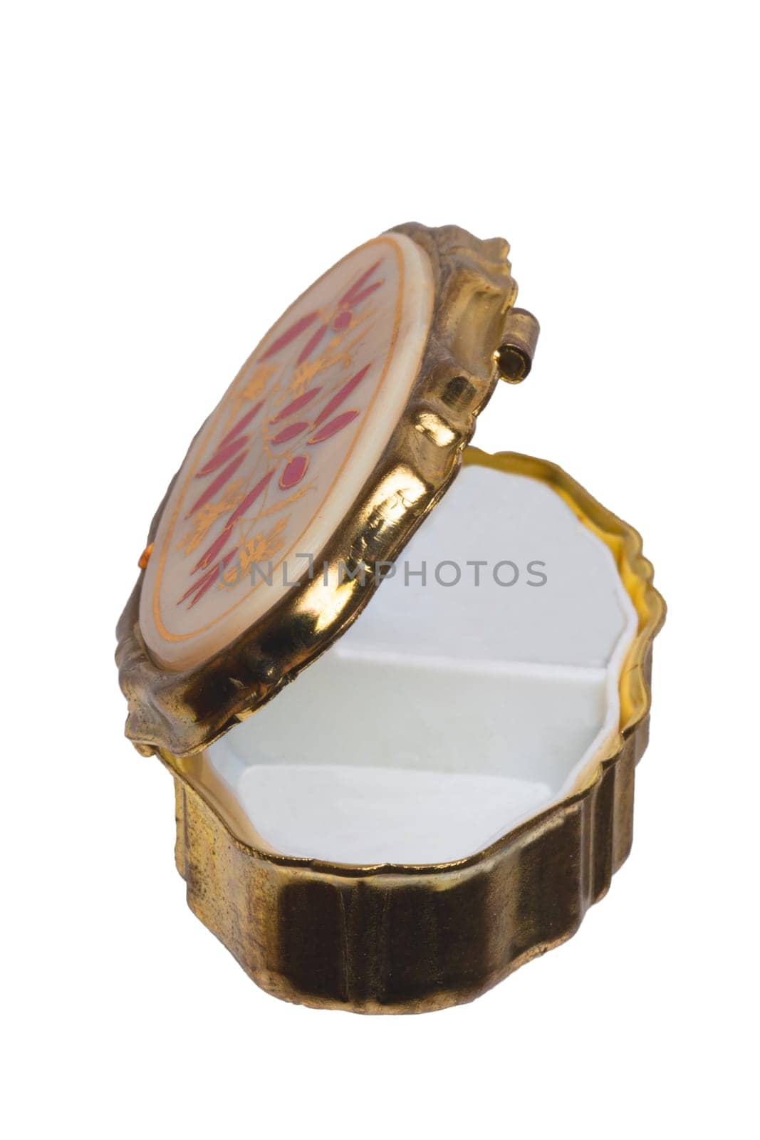 Closeup of a empty opened old gold casket for jewellery bracelets and luxury accessories isolated on a white background. Macro.