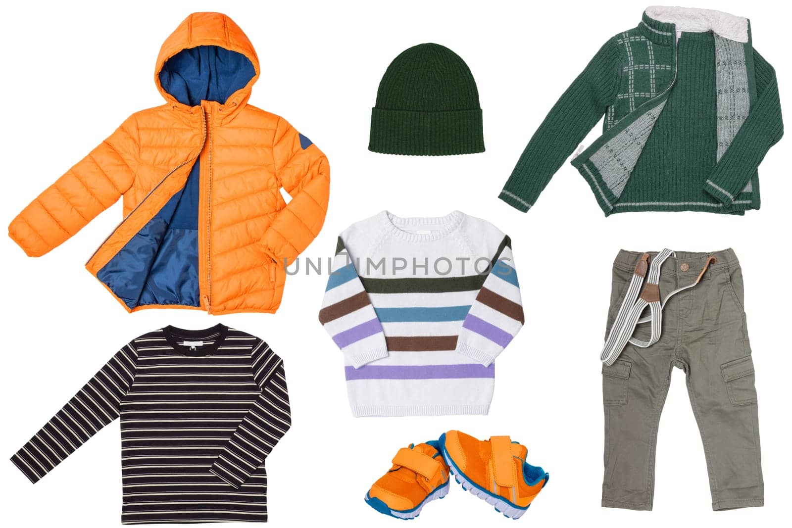 Collage set of little boy autumn clothing isolated on a white background. Denim trouser or pants, shoes, a rain jacket, pullover, shirt, hood and a sweater for child boy. Kids spring and winter fashion.