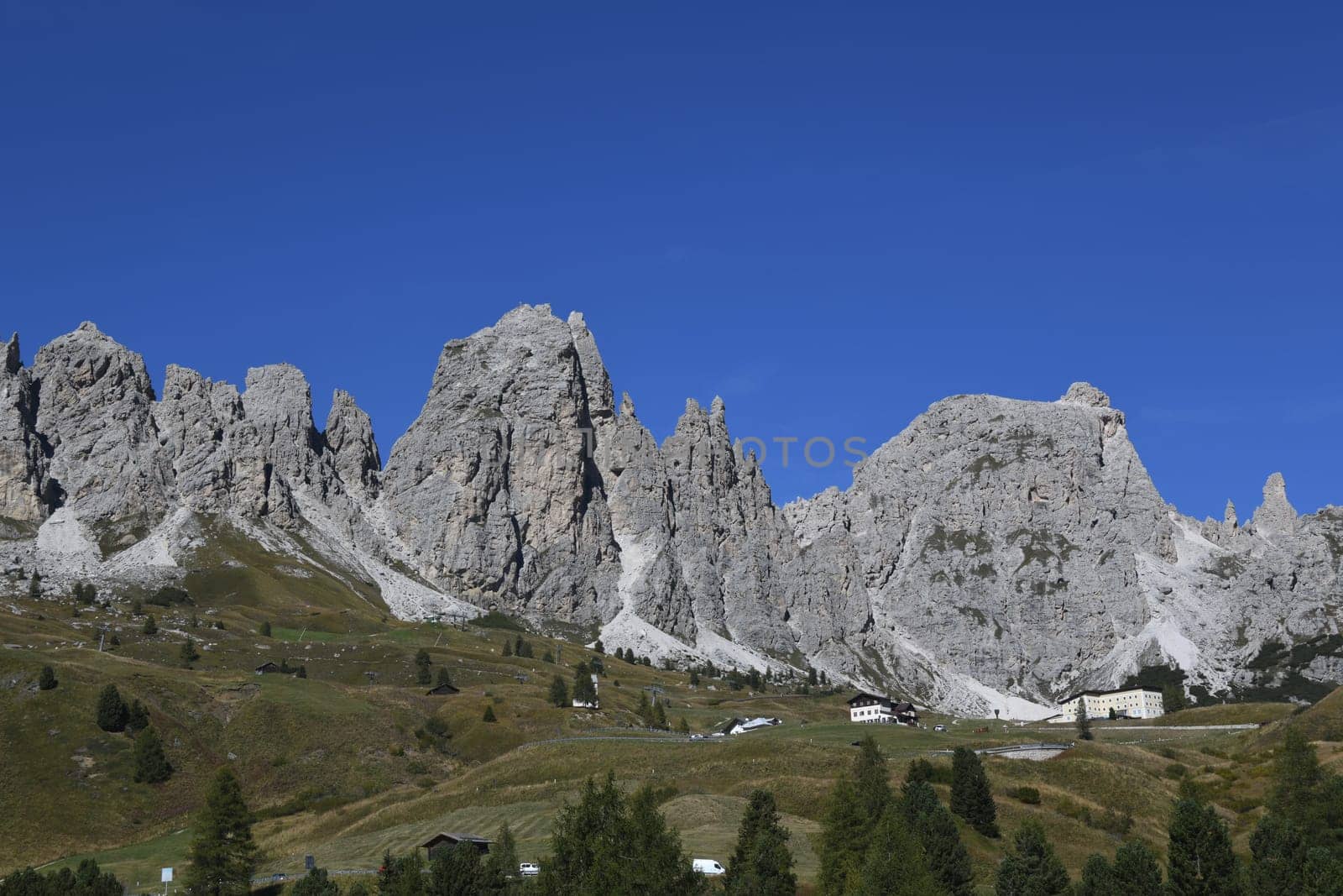 Panoramic view of the Gardena Pass and the pass road in the South Tyrolean Dolomites. It connects Val Gardena in Val Badia and the municipalities of Selva,Corvara,Colfosco and Alta Bad