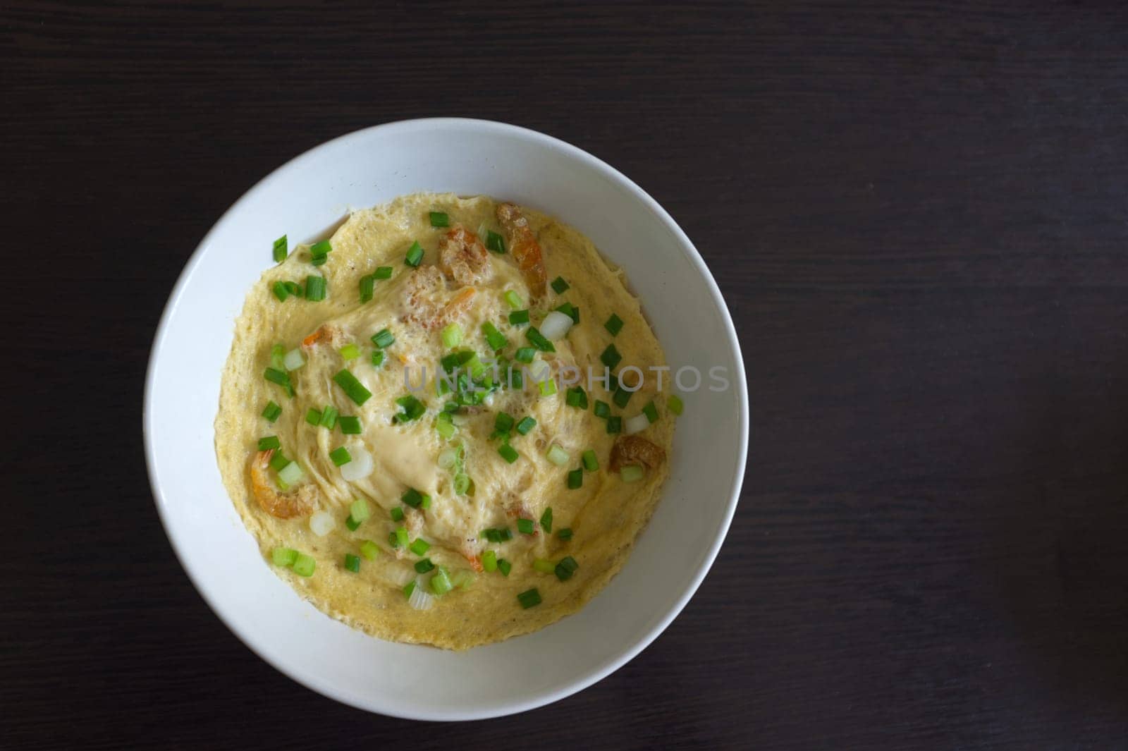 Steamed Egg or Kai thoon  (Thai foods), Chawanmushi (Japanese foods) on black  floor