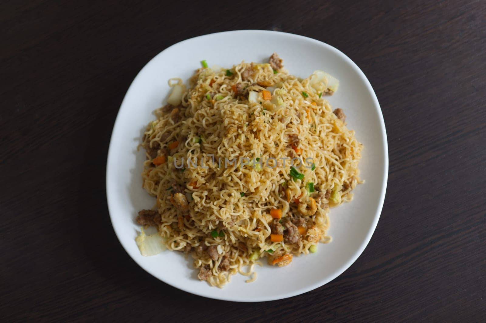Fried instant noodle with carrot  and pork