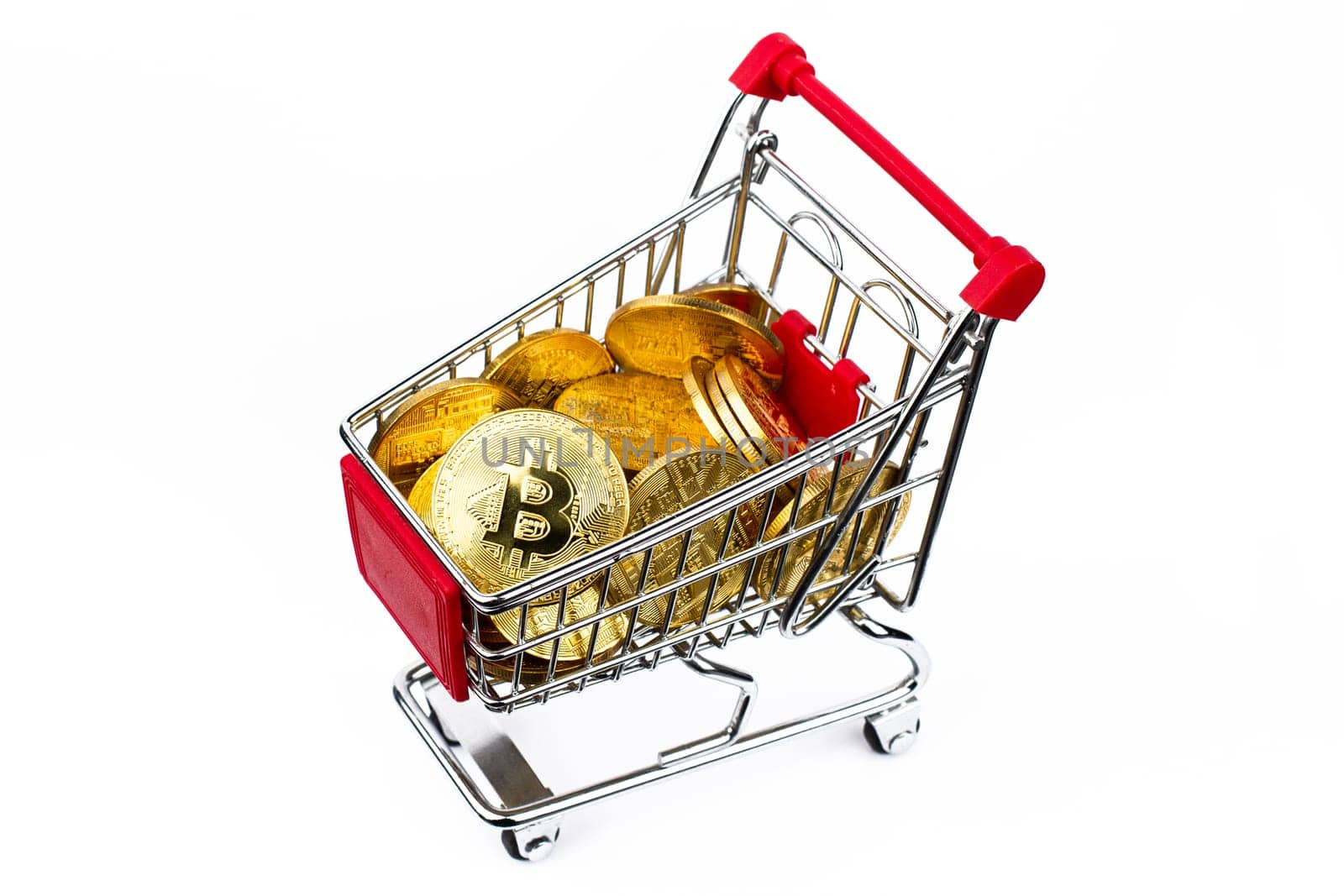 top view closeup cryptocurrency concept of market shopping cart full of bitcoin golden crypto coins isolated on white background
