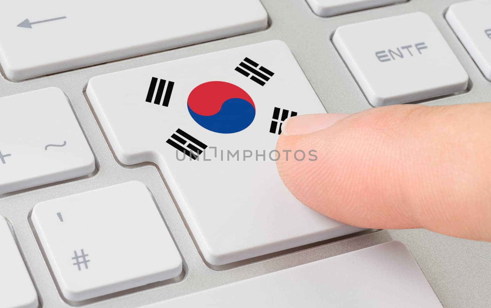 A keyboard with a labeled button - Flag of South Korea