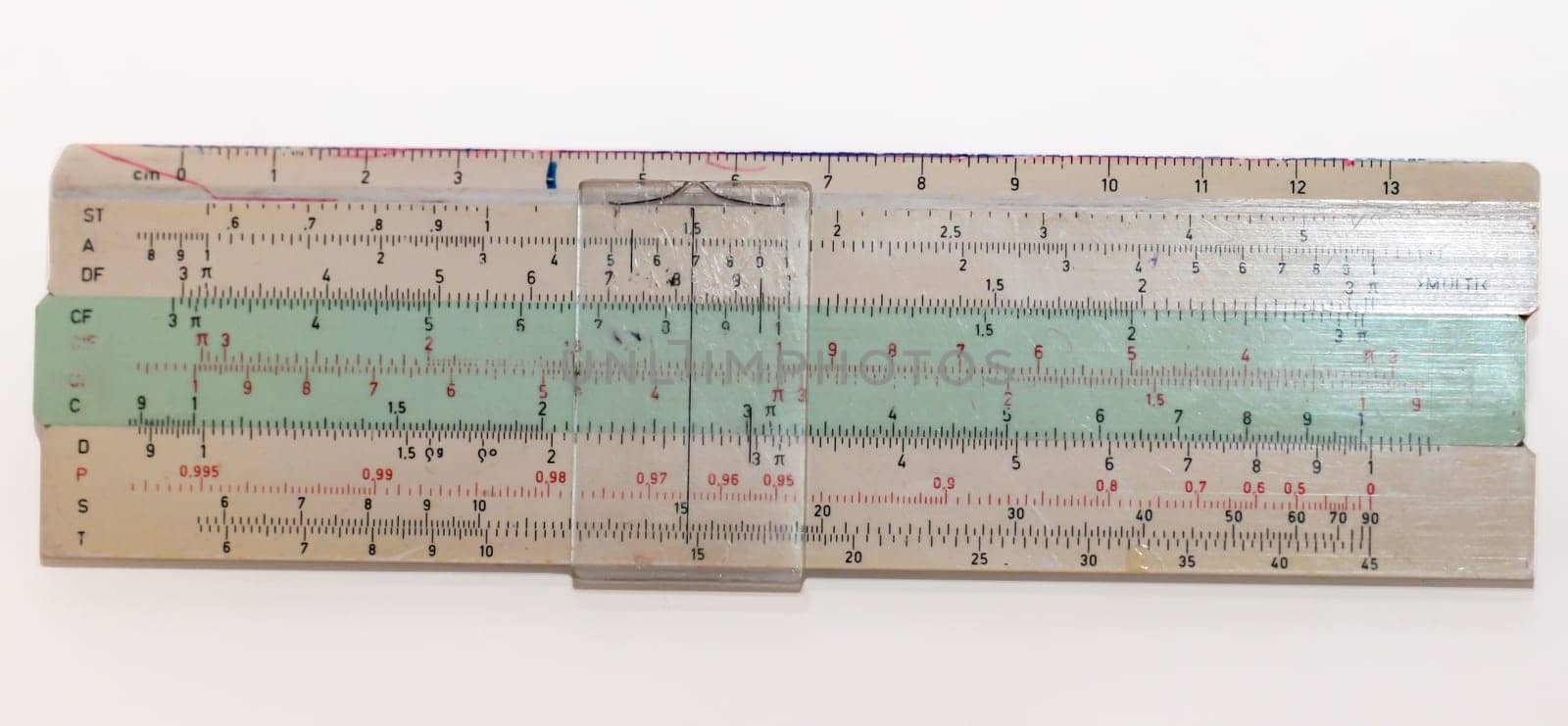 Picture of an old slide rule from GDR times that the students used. Antique calculator.
