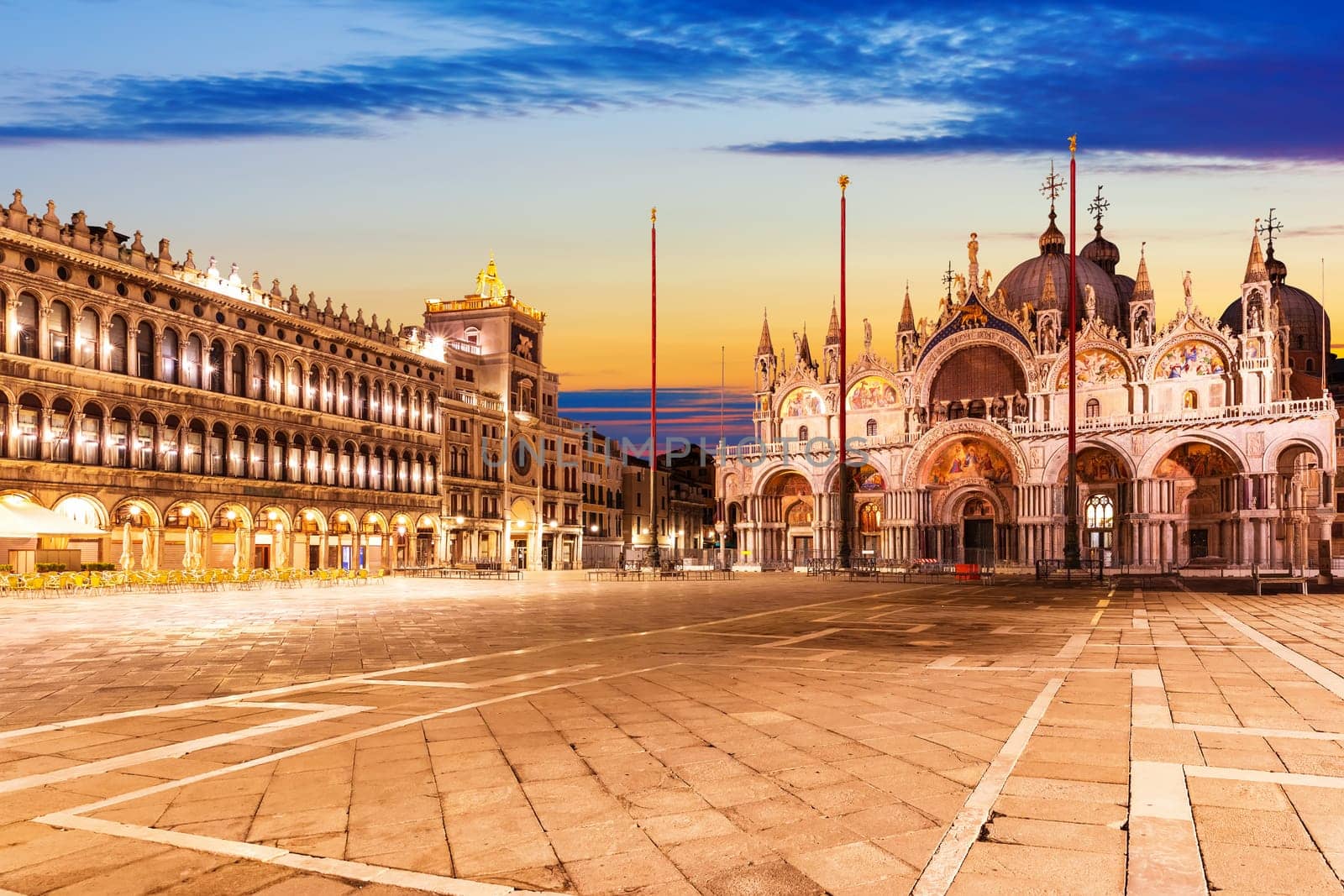 Venetian Basilica San Marco and the Clocktower in the Square Piazza San Marco, Italy.
