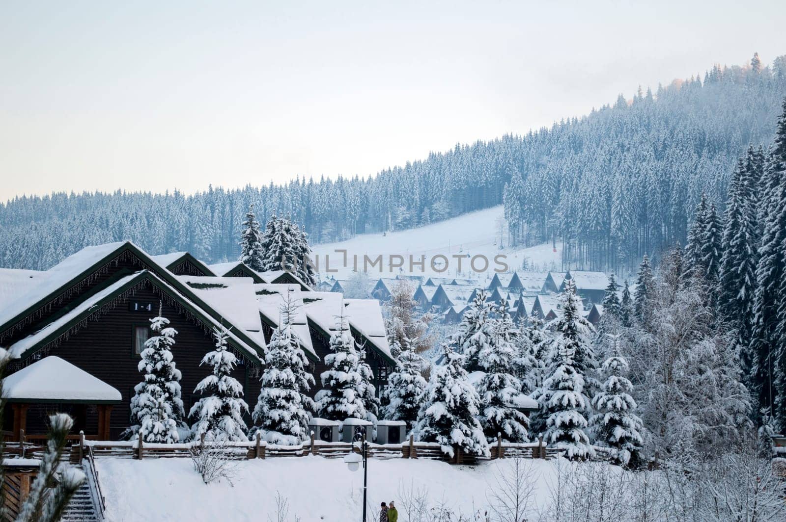 beautiful resort town of Bukovel in winter, the theme of mountain sports, skiing, Bukovel, Carpathian mountains Ukraine, new year, Christmas, holidays