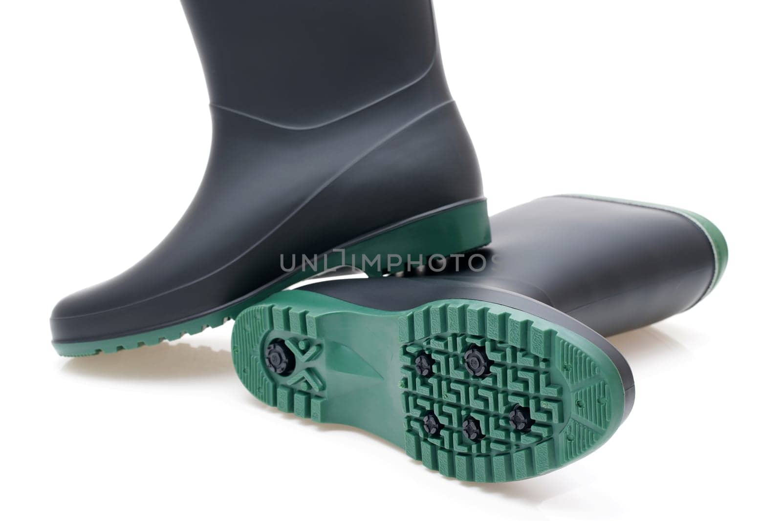 Pair of black waterproof rubber boots isolated on a white background