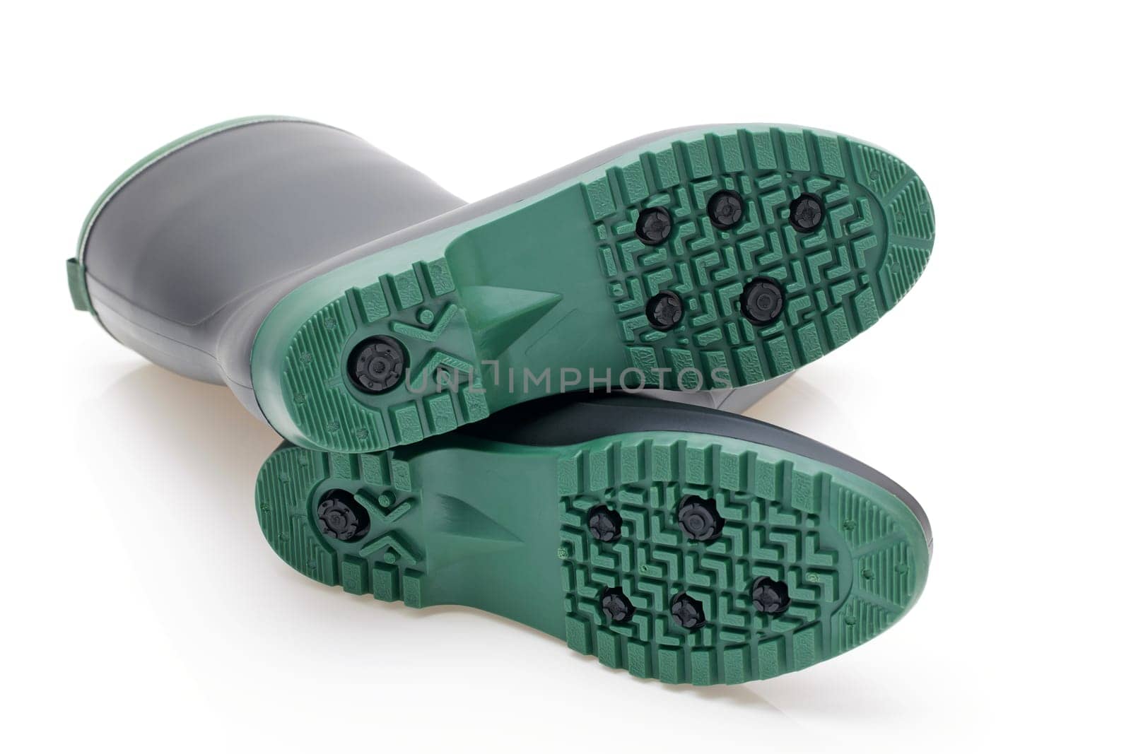Pair of black waterproof rubber boots isolated on a white background