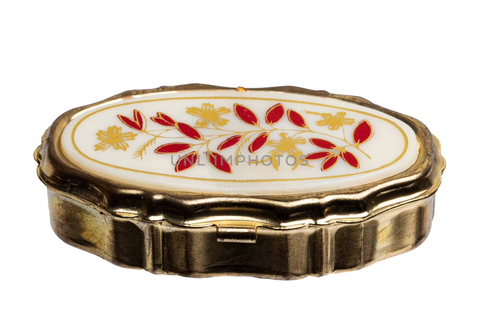 Closeup of a closed old gold casket for jewellery bracelets and luxury accessories isolated on a white background. Macro.