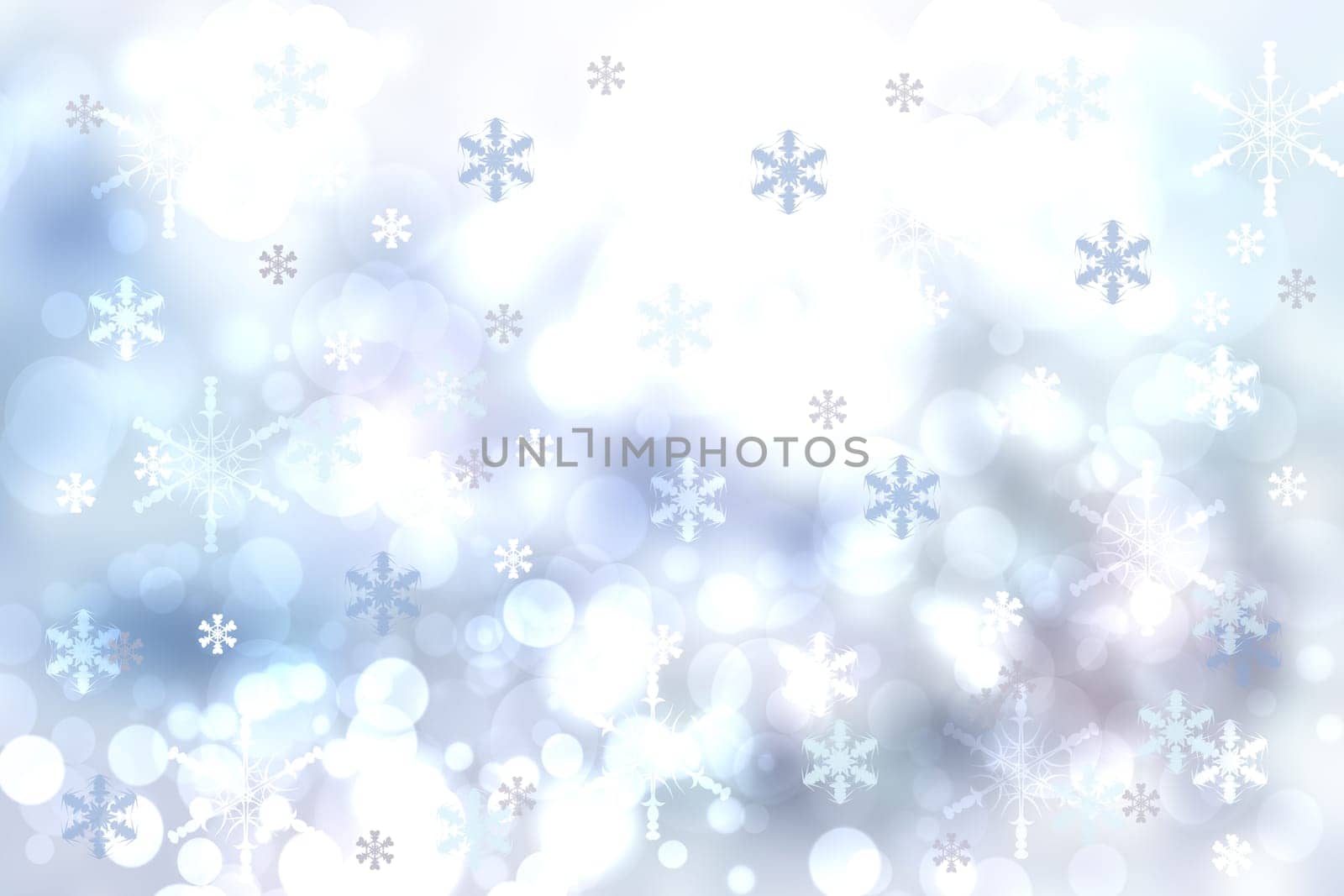Abstract blurred festive light blue winter christmas or Happy New Year background texture with shiny blue and white bokeh lighted glittering snowflakes and stars. Space for your design. Card concept.