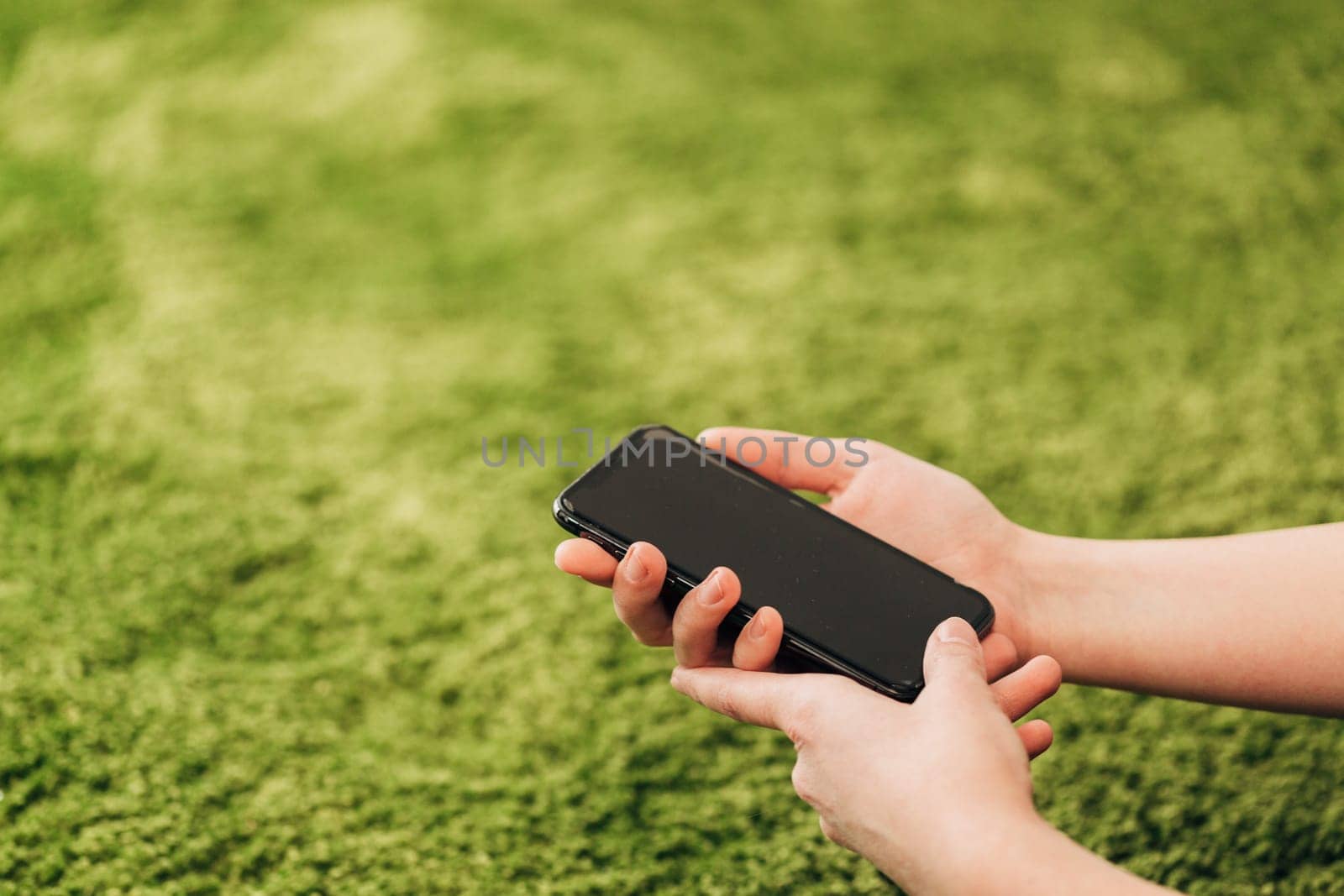 Girl Holds An New Smart Phone In Her Hand.