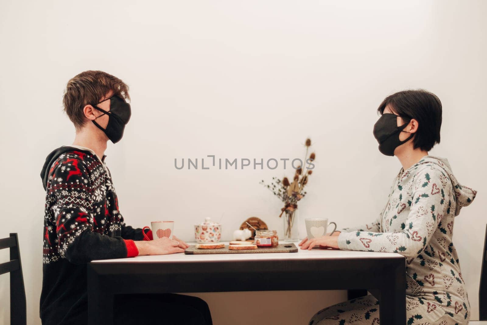 Girl and Guy Kissing in Masks on Quarantine COVID-19.