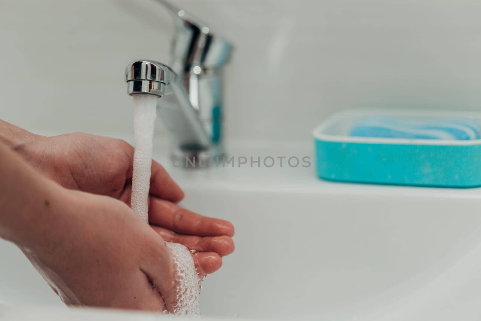 The Girl Washes Her Hands to Avoid Infection With the Virus COVID-19.