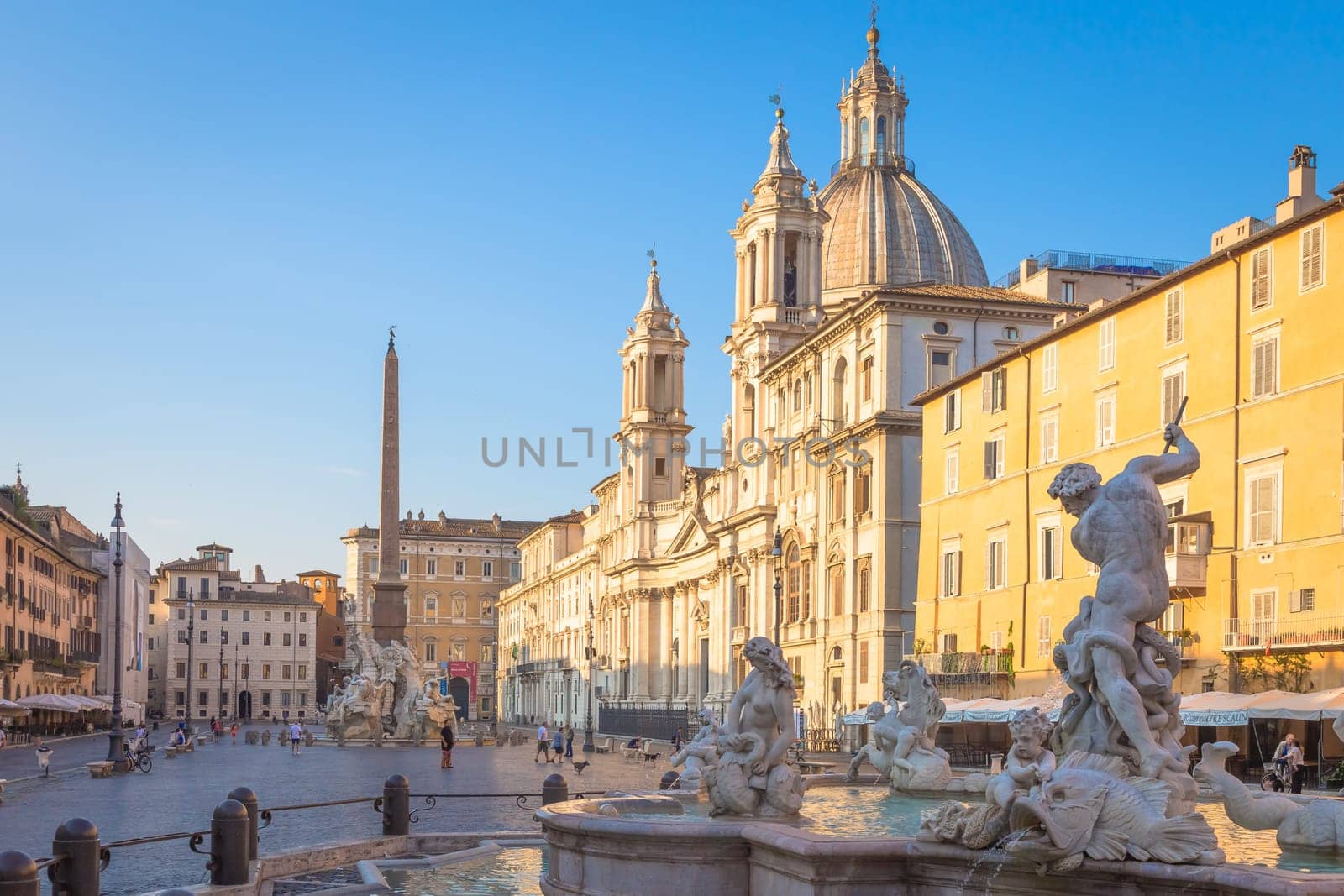 ROME, ITALY - CIRCA AUGUST 2020: Sunrise light on Piazza Navona (Navona Square) buildings