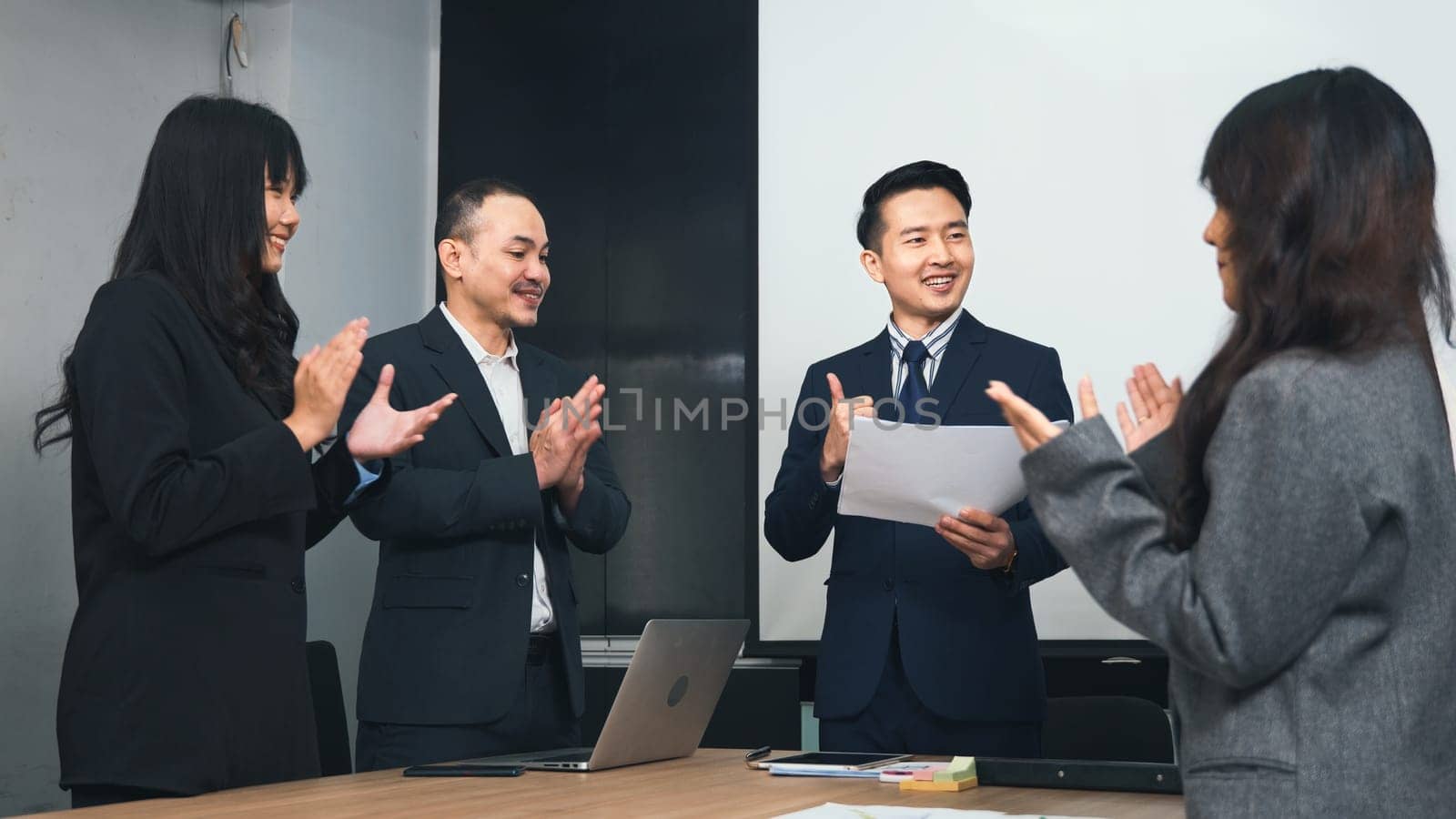 Business people team confident working and communicating together and were clapping applauding their hands success happy and smiling in meeting room at office, Agreement business concept