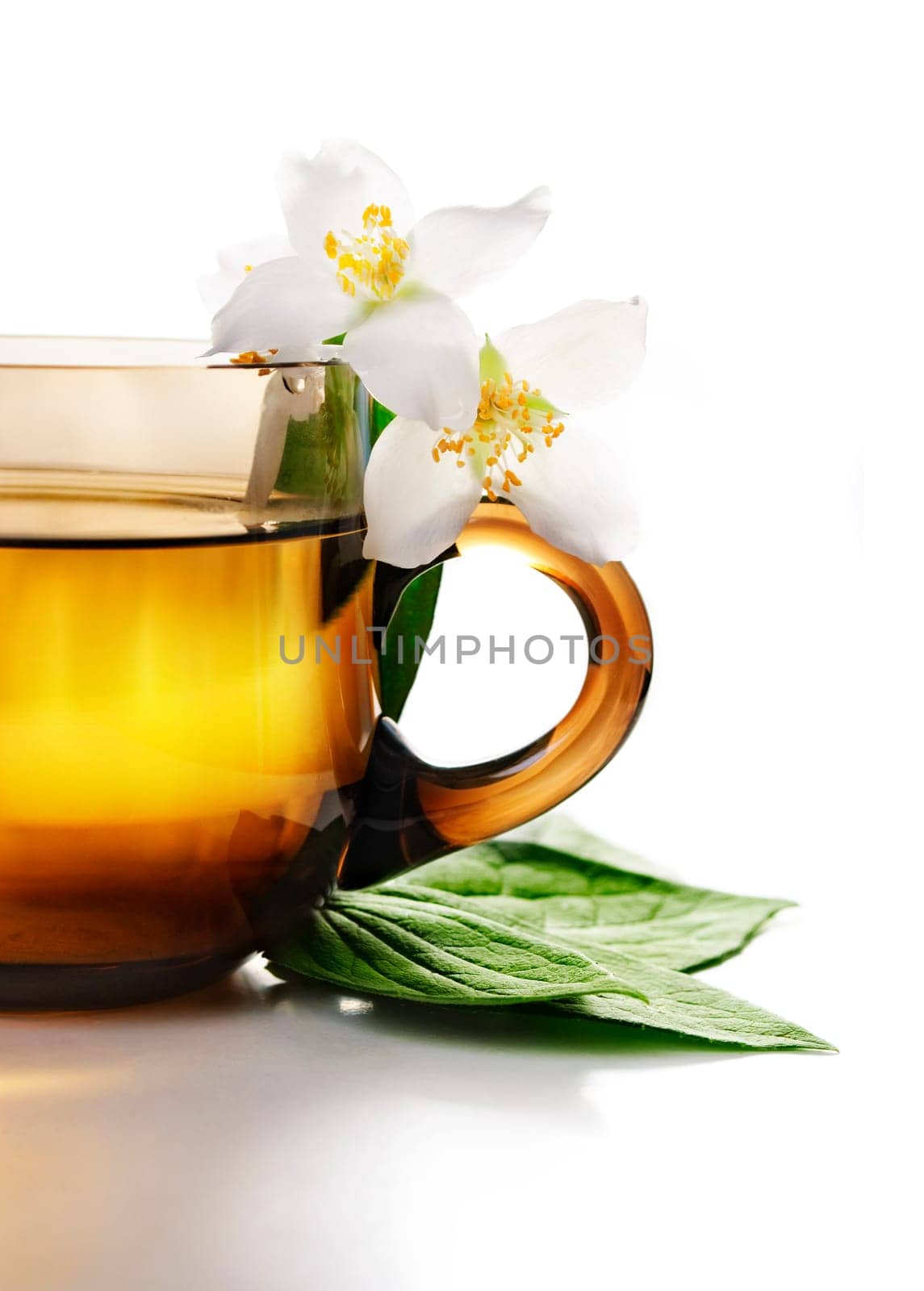 Cup of jasmine tea with white background