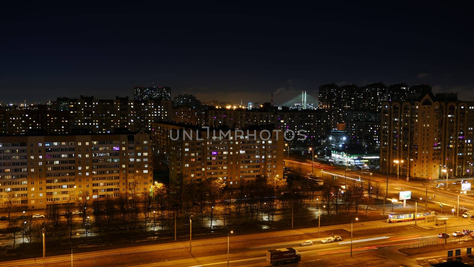 St. Petersburg at night from a bird's eye view, city lights, night traffic, lights in the windows of buildings