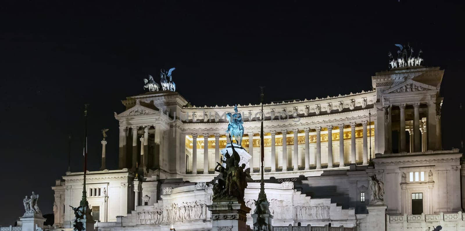 View of the Vittoriano at night at Piazza Venezia in Rome. National monument and symbol of the unification of Italy dedicated to King Vittorio Emanuele II Savoia