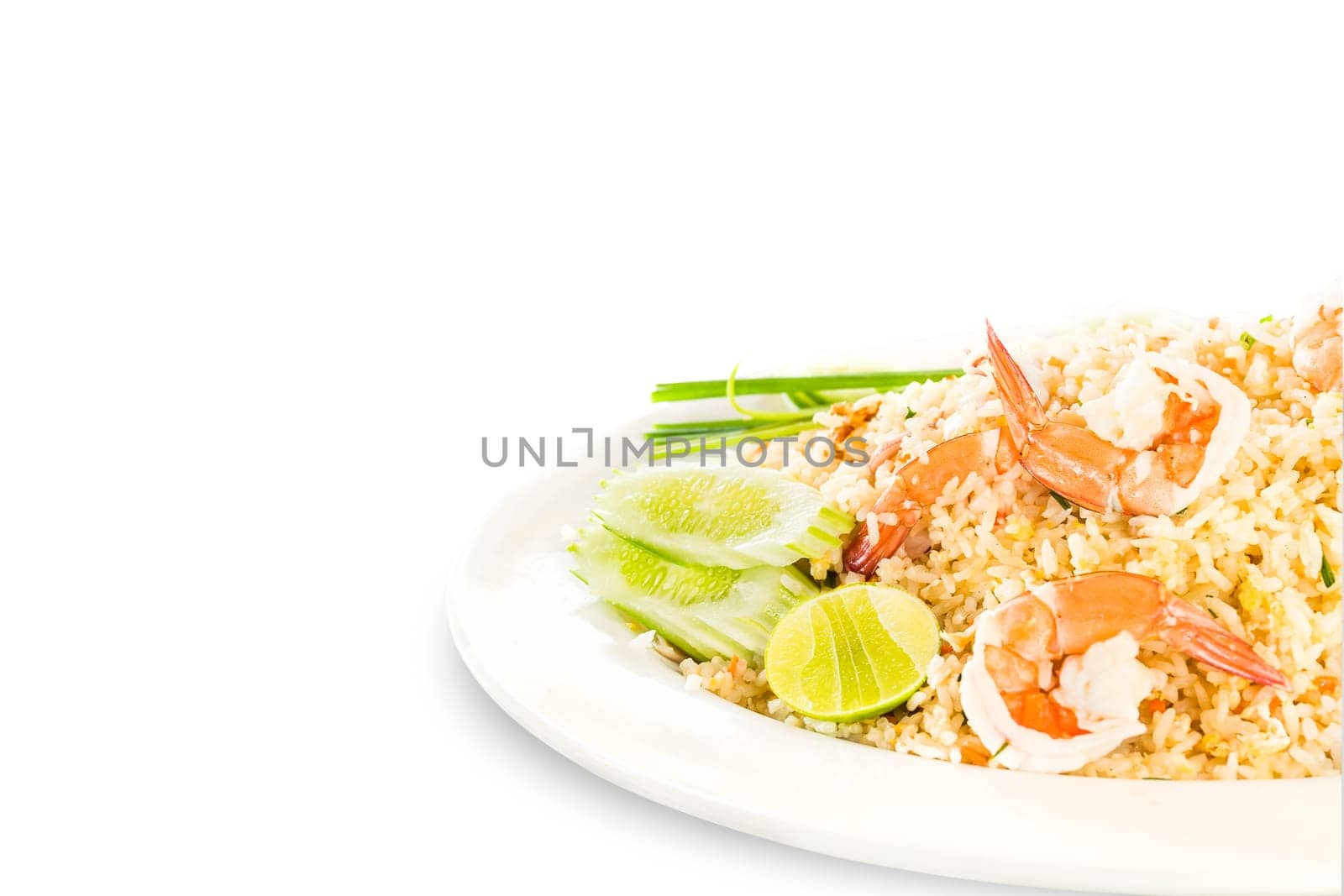 Fried rice with shrimp in white plate on white background