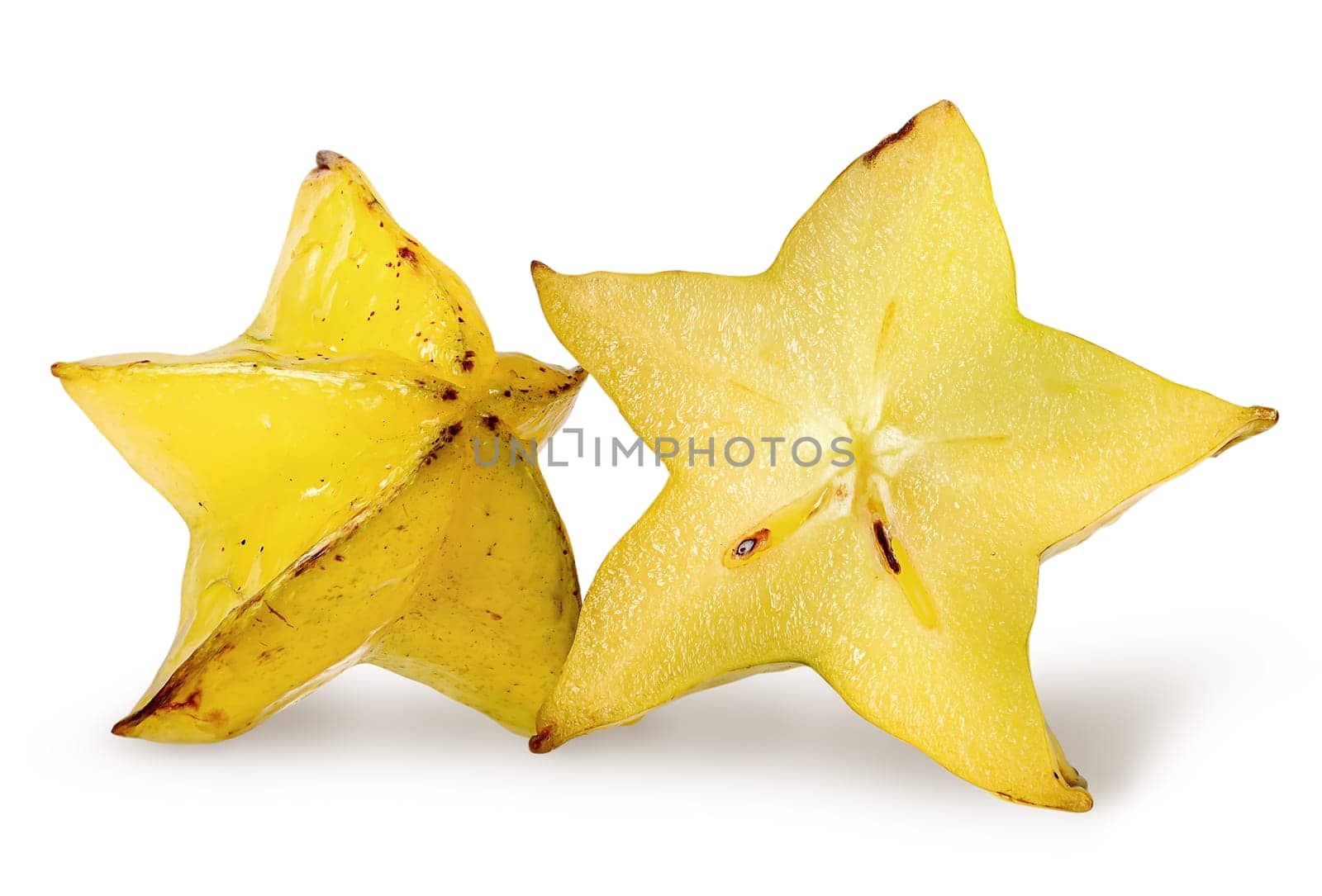 Two slices of carom isolated on white background