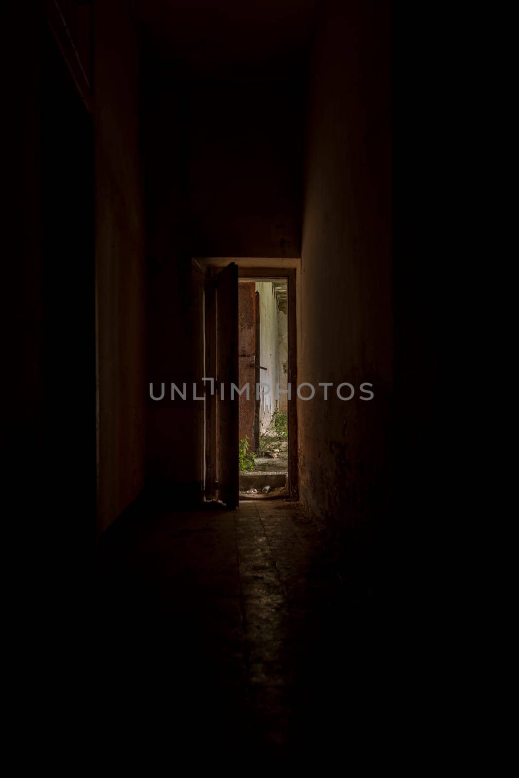 Interior of a decaying abandoned house. Art nouveau colors. Window openings. Mystery and darkness. long exposure times.