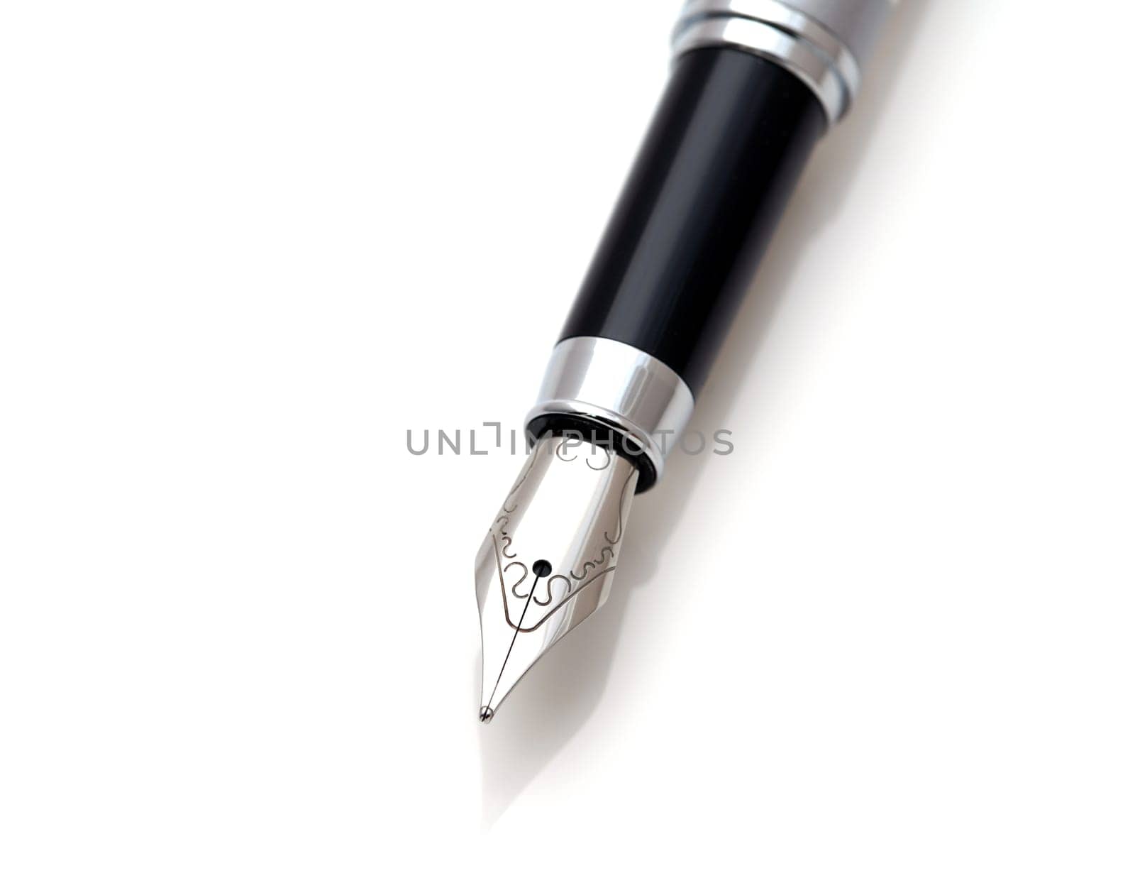 Close up of details of a fountain pen on white background
