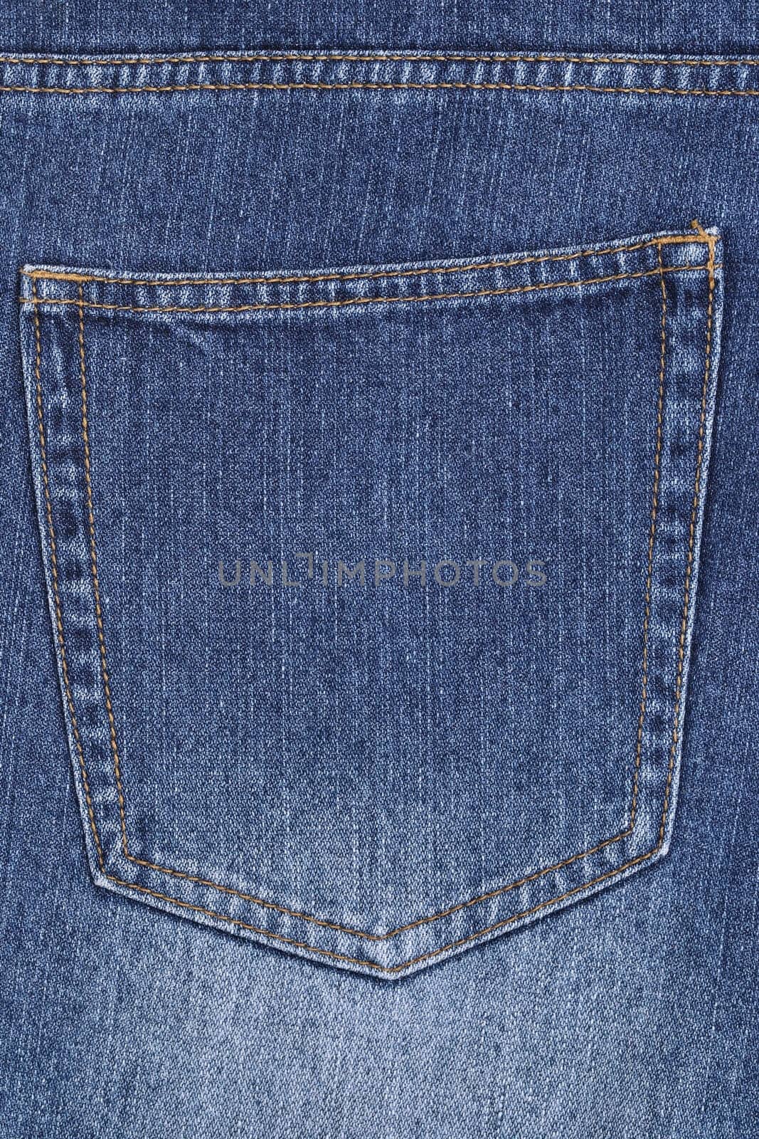 blue jeans with back pocket as background, closeup