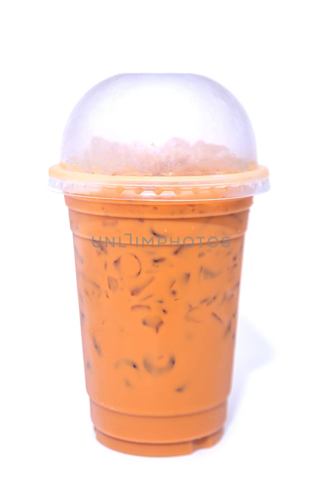 Tea thai, Ice tea milk or Ice milk tea, Sweet drink with whipped cream on white background